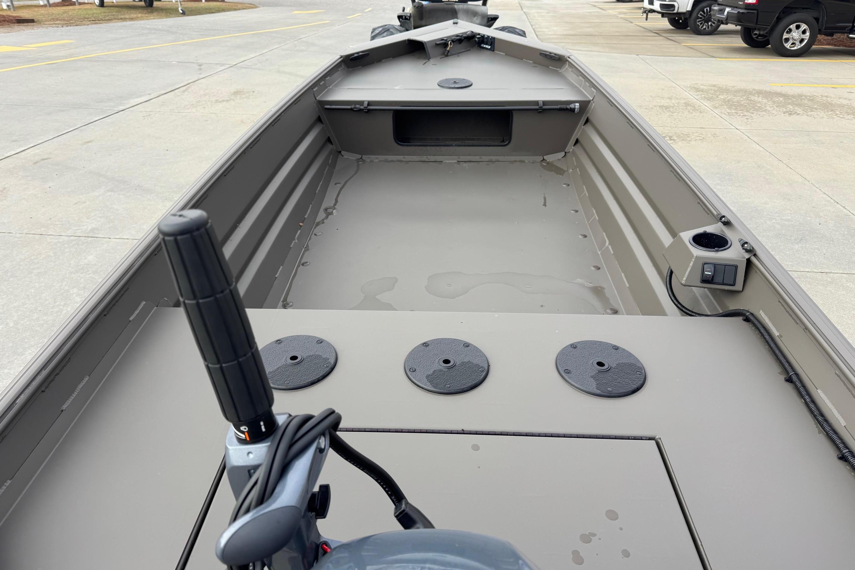2026 Alweld 1548VV Marsh boat interior with steering handle and storage compartments.