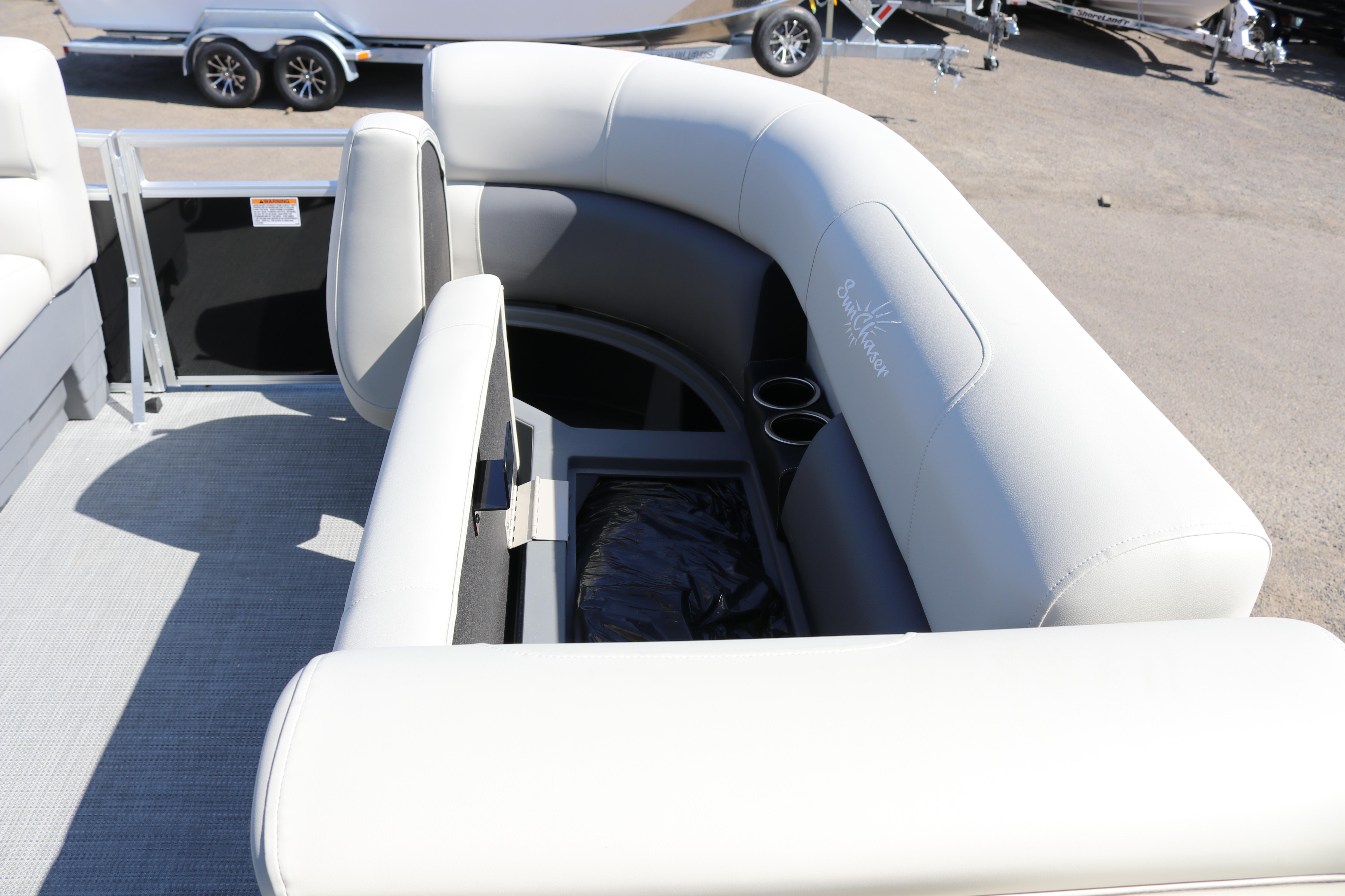 2025 SunChaser Vista 20 Fish boat interior with cushioned seating and cup holders.