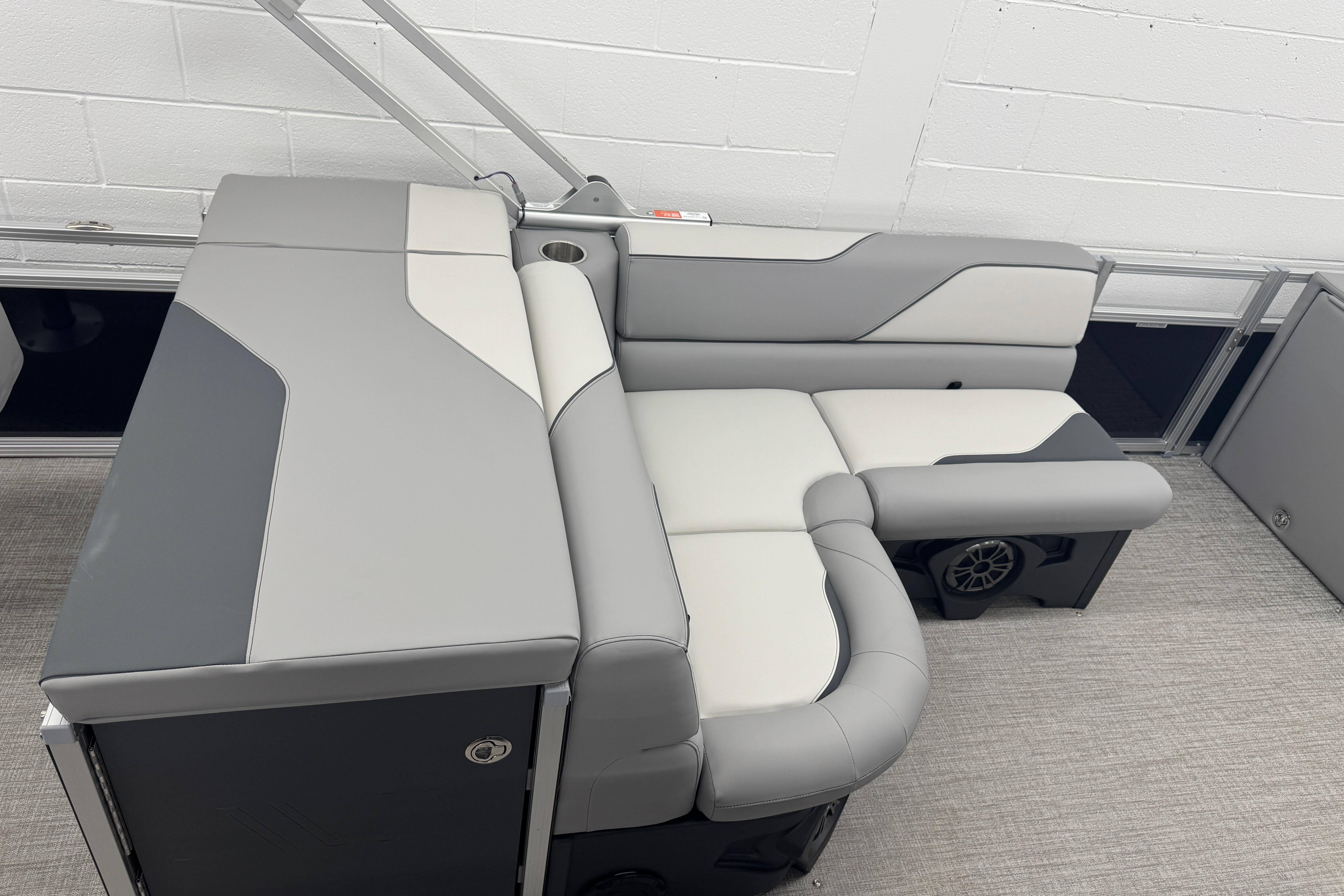 2026 Avalon Ventue 85 RF boat interior with sleek gray and white seating design.