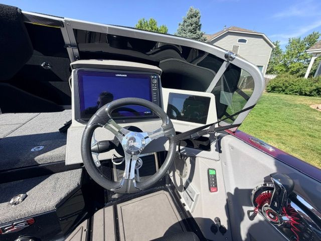 The image shows the cockpit of a 2024 Ranger 621FS Pro boat with modern instruments.