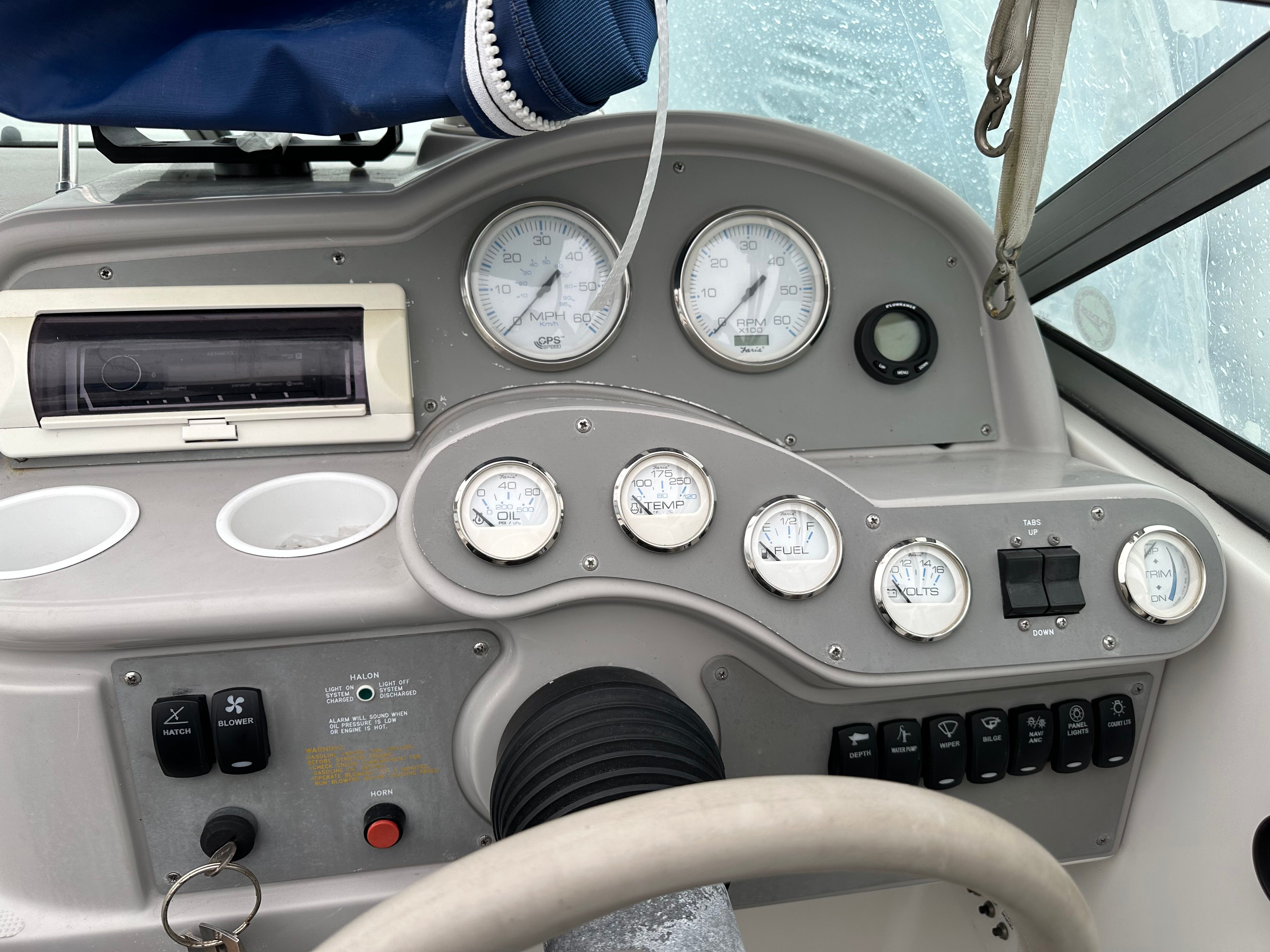 Dashboard of a 2000 Formula 260 Sun Sport boat with gauges.