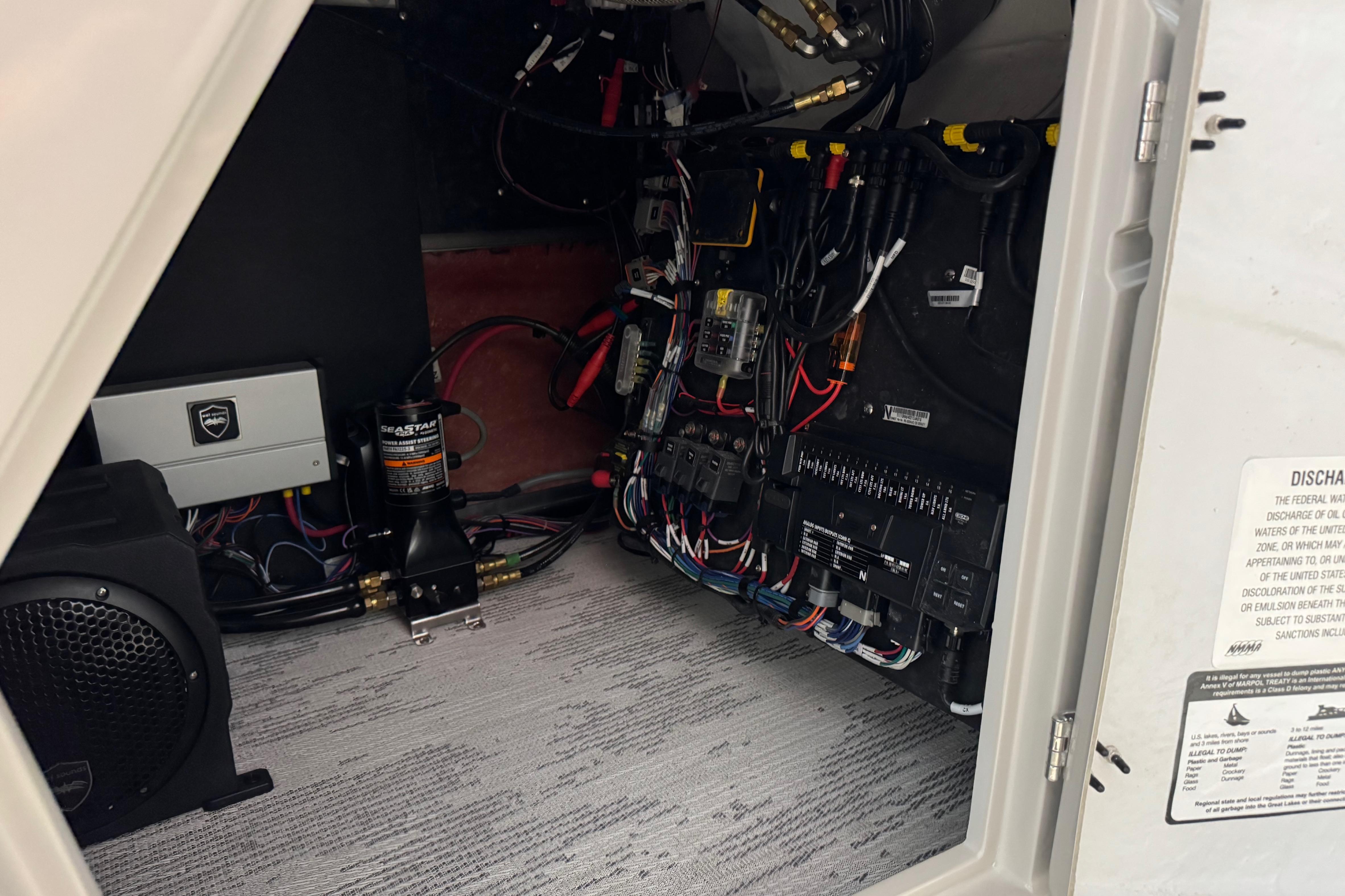 Electrical system inside 2026 Sylvan G5 CLZ boat, showcasing wiring and components.