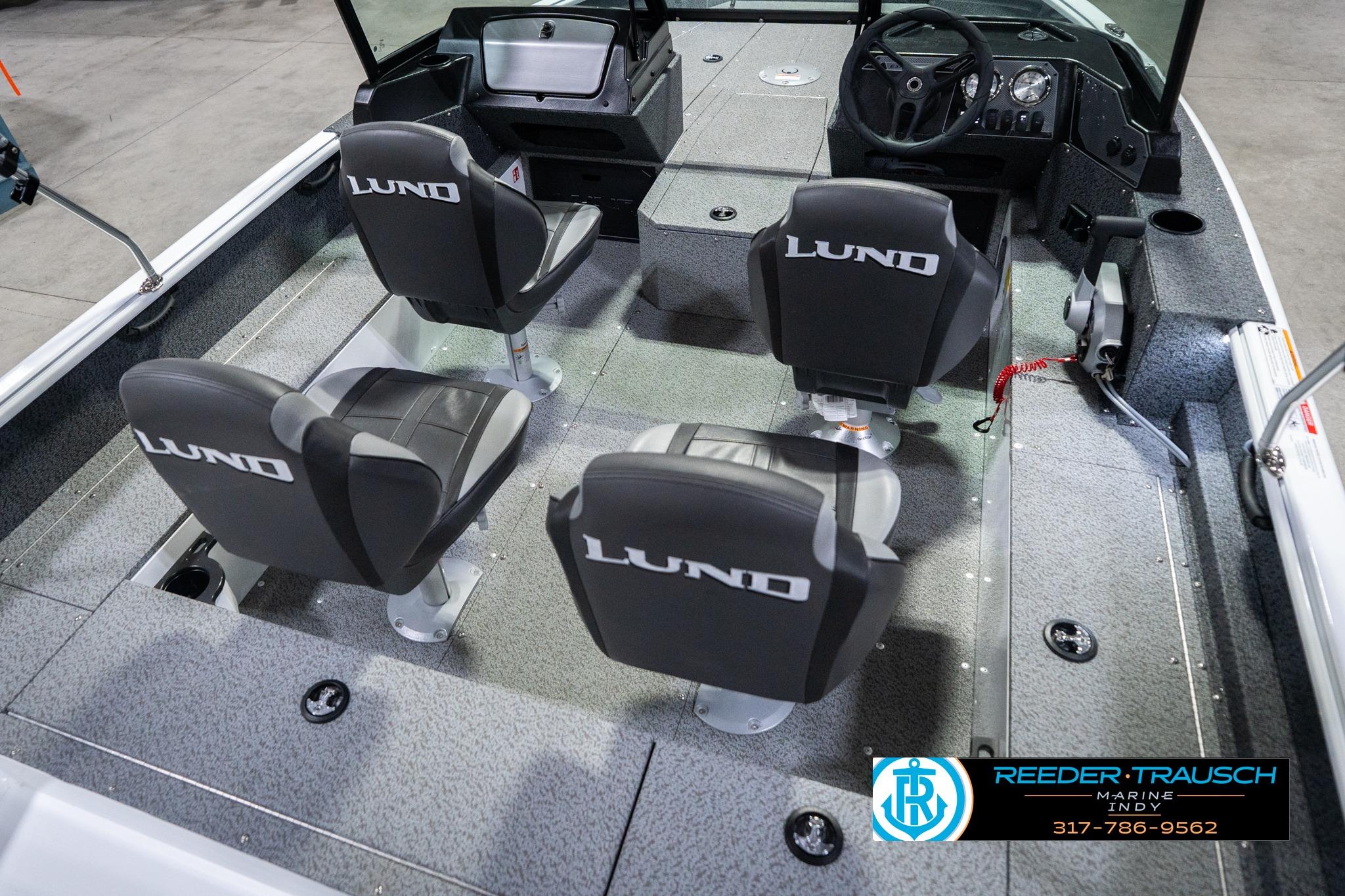 2026 Lund 1700 Explorer Sport boat interior with four seats and steering console.
