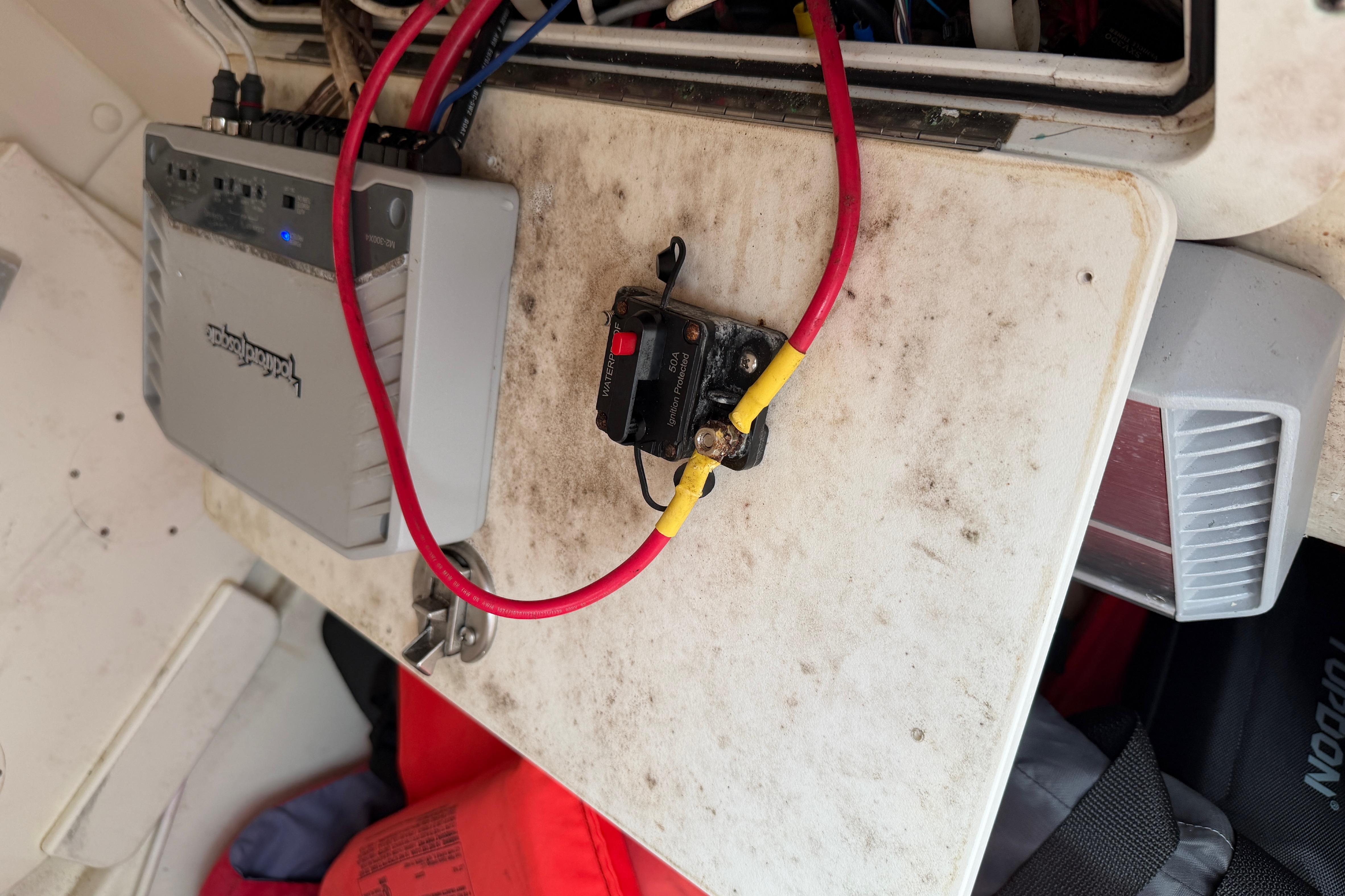Electrical setup on a 2019 World Cat 230 DC boat, featuring wiring and components.