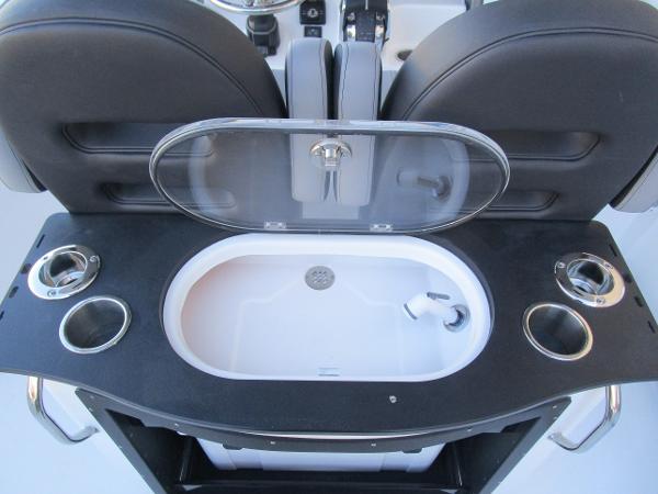 2025 Sea Pro 292 Offshore boat interior with sink and cup holders.