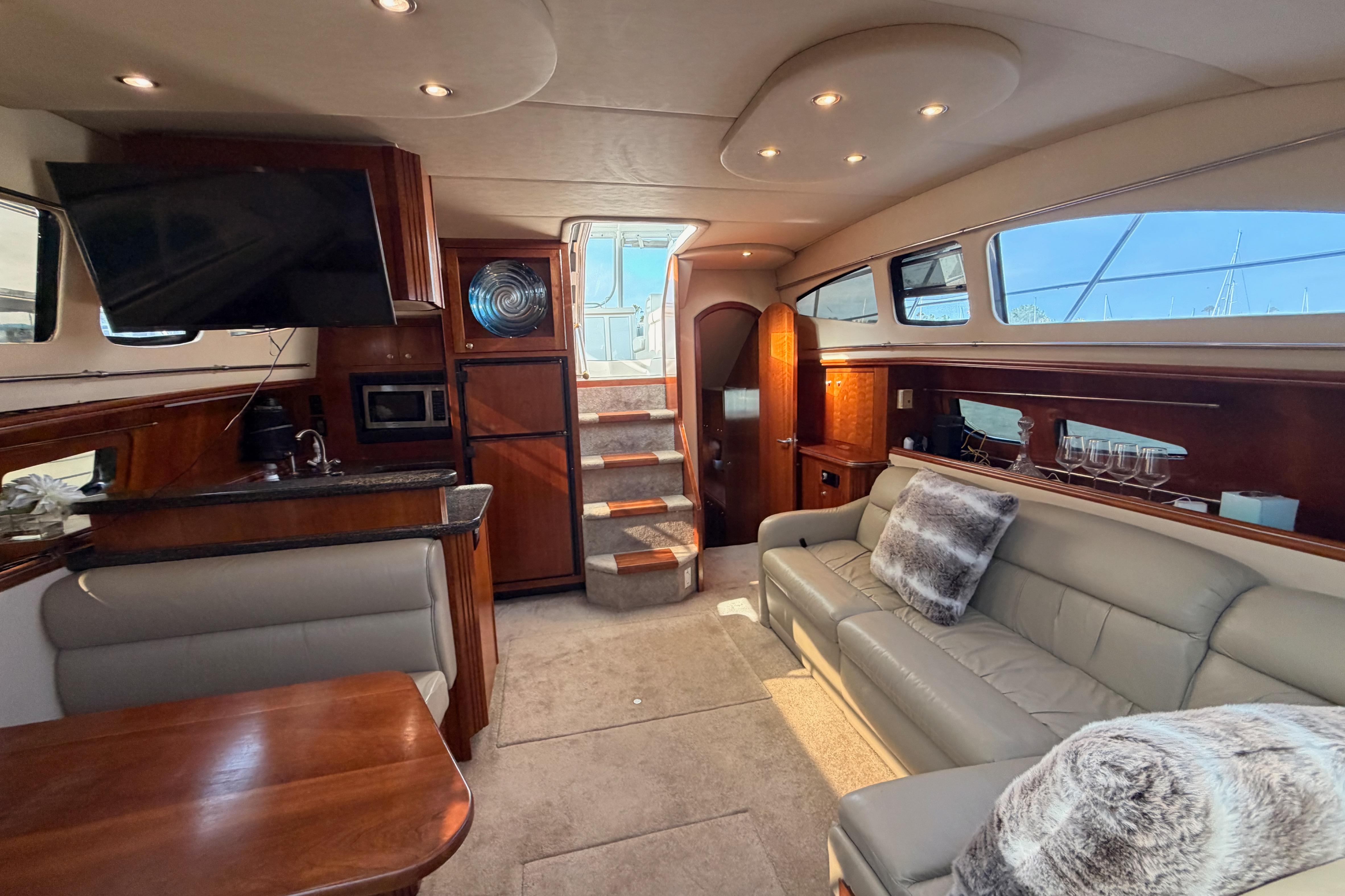 Luxurious interior of 2005 Cruisers Yachts 405 Express Motoryacht with plush seating and modern amenities.