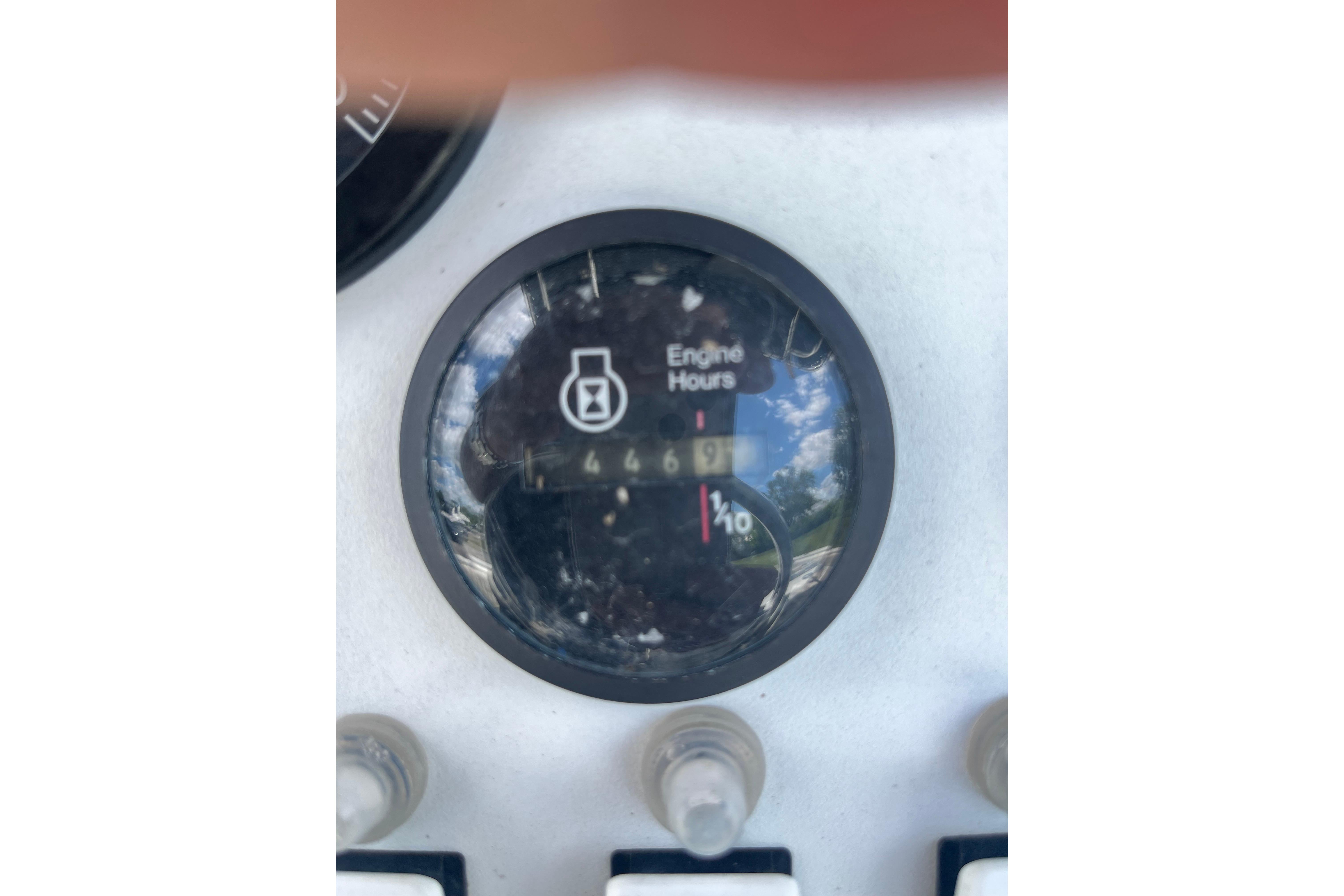 Close-up of a 1997 Stamas engine hour meter displaying 466.9 hours.