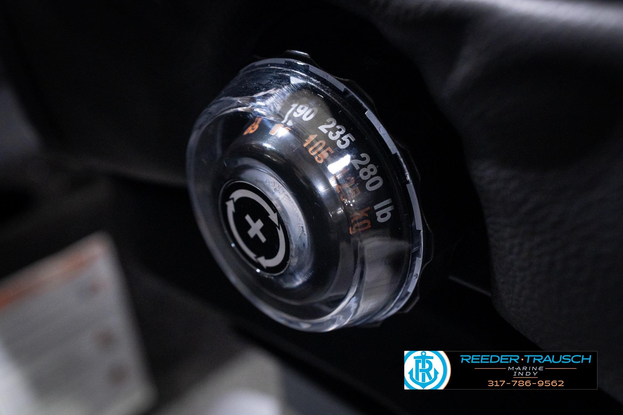 Close-up of a control knob on a 2026 Lund 1775 Impact XS SS boat.