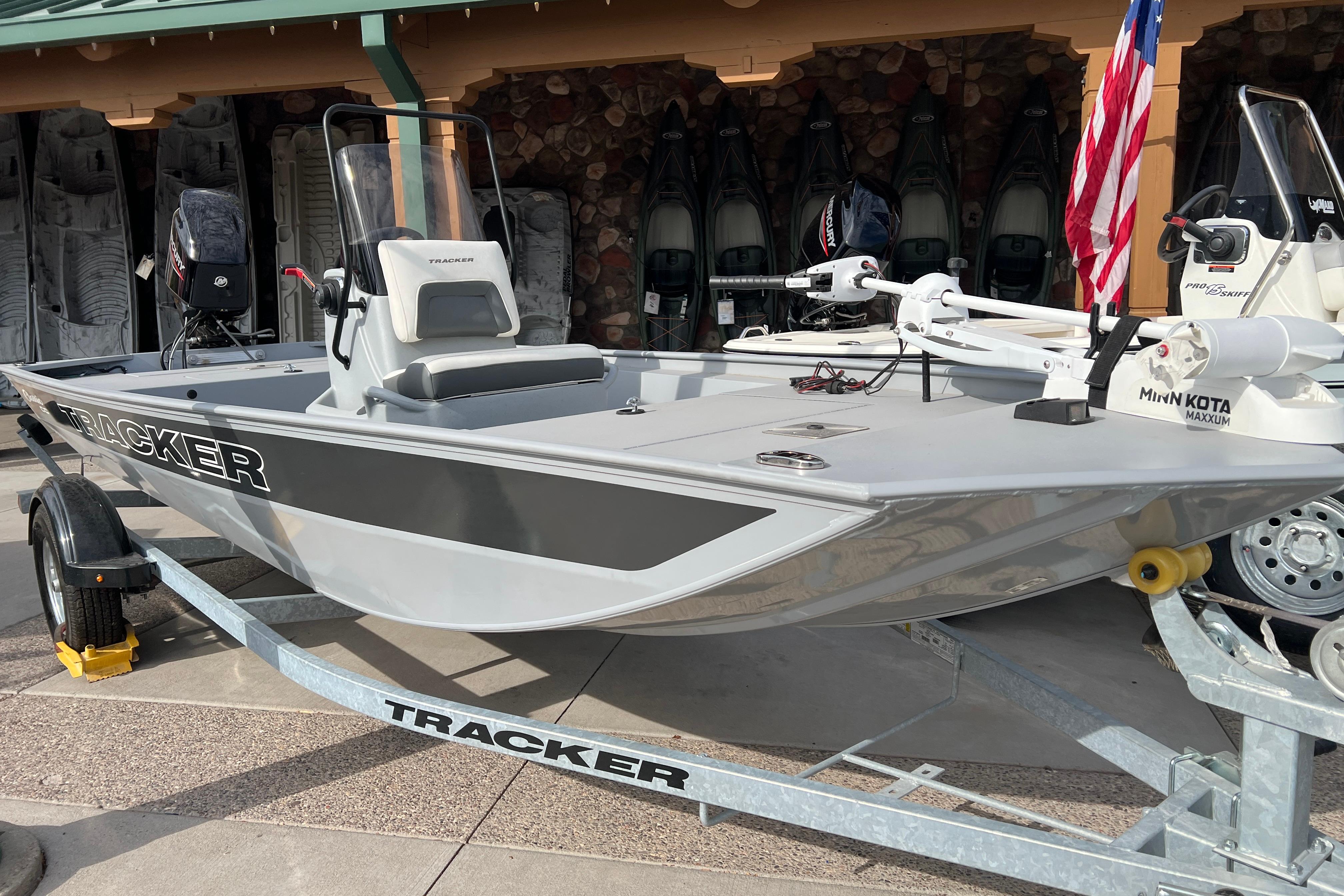 2026 Tracker Bass Tracker Classic CC boat on trailer, displayed outdoors.