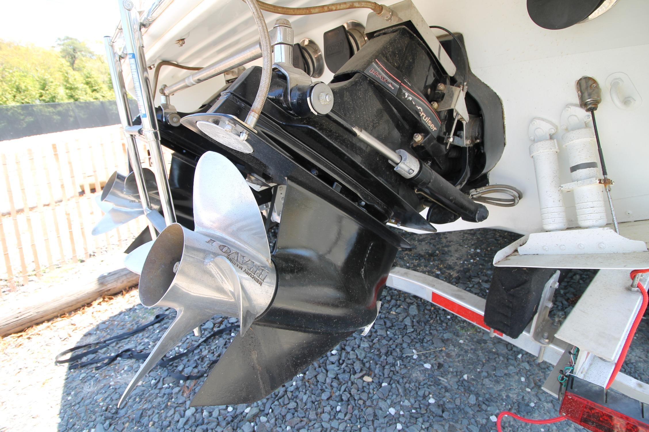 2006 Formula 292 FASTech boat propeller and outdrive close-up on trailer.