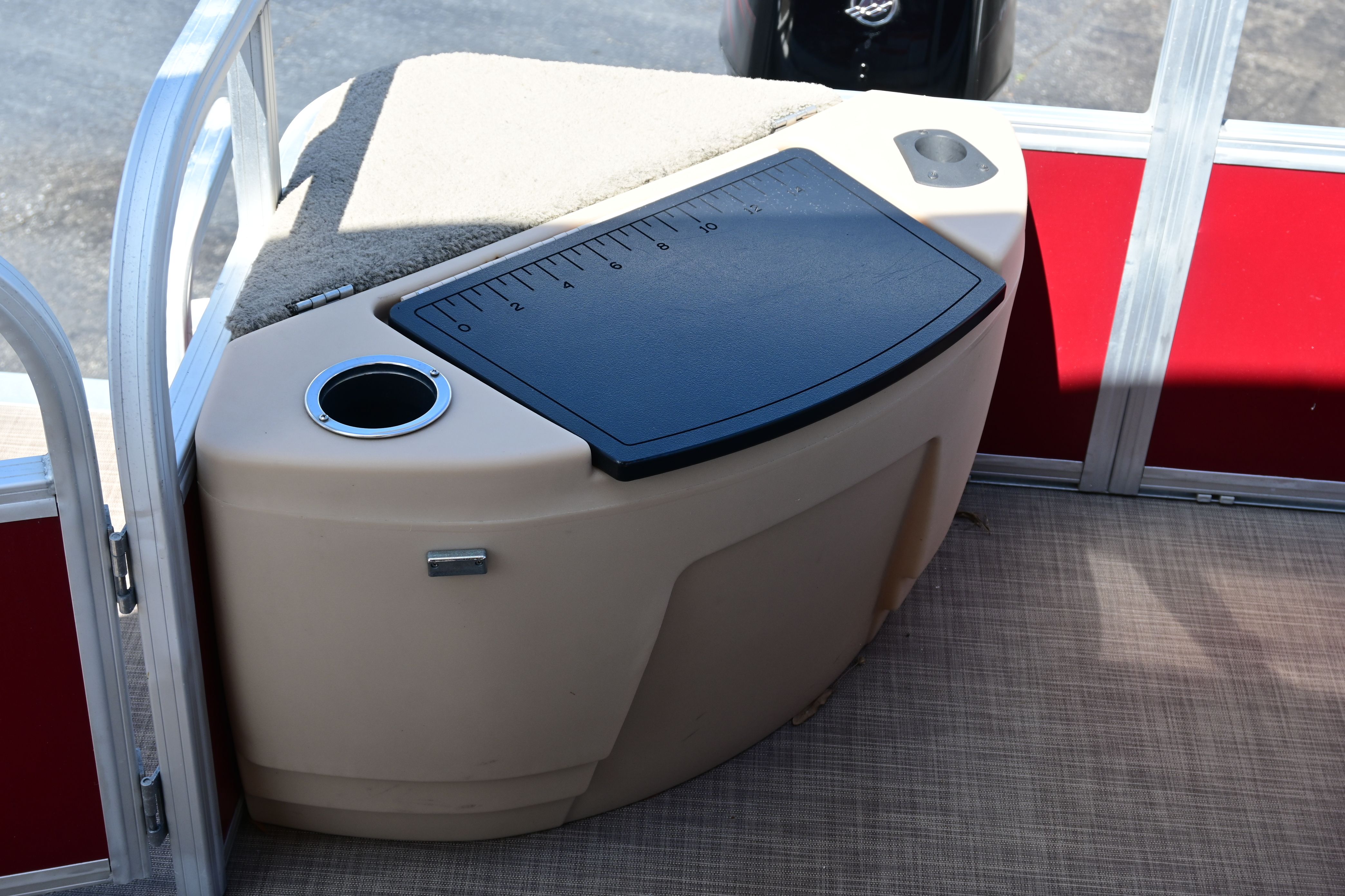 Sun Tracker FISHI 2019 boat with measuring board and cup holder.