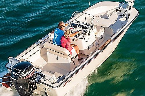 2026 Boston Whaler 170 Montauk boat cruising on open water with two passengers.