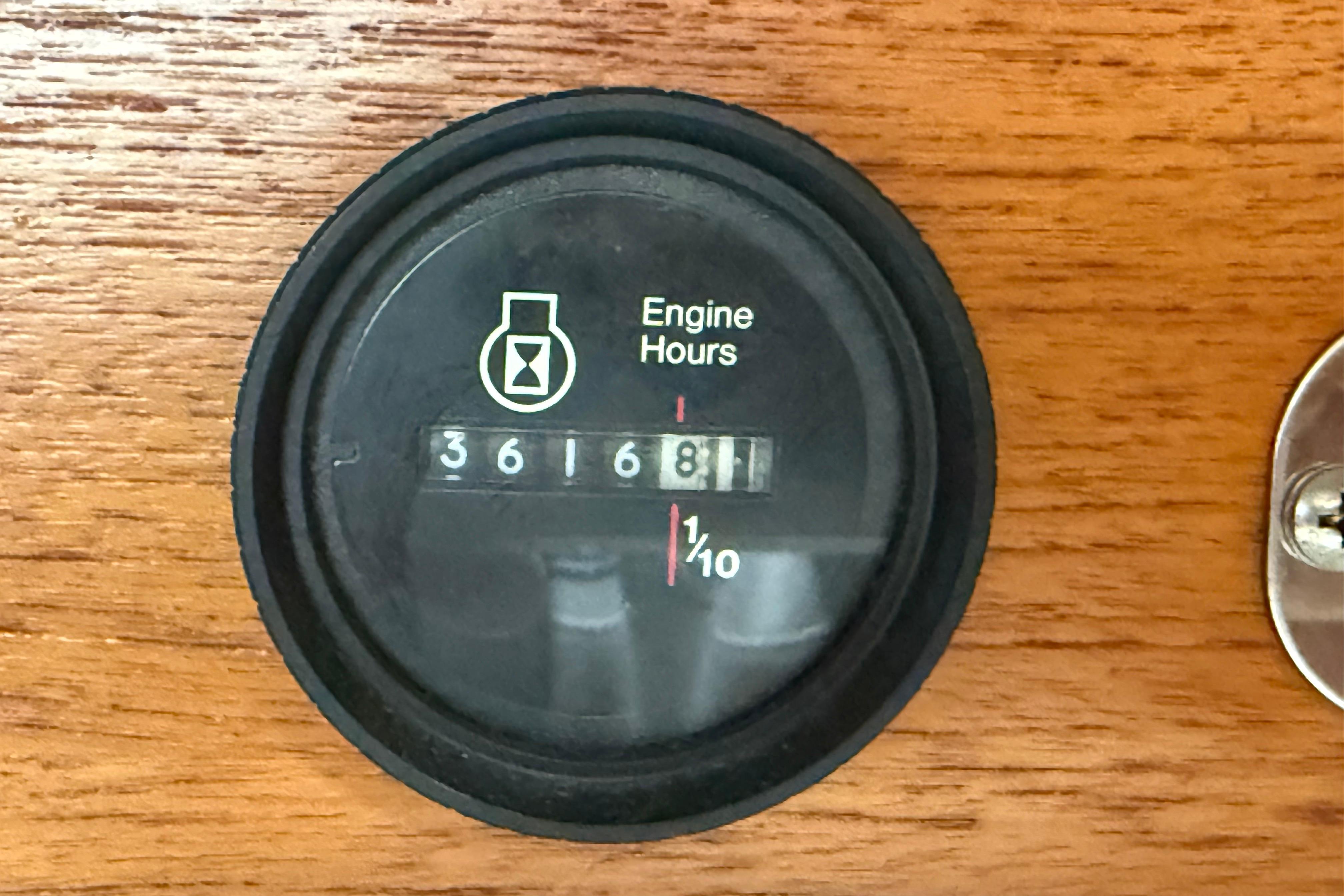 Engine hour meter reading 3616.8 on 1988 Ericson 32-200 yacht dashboard.