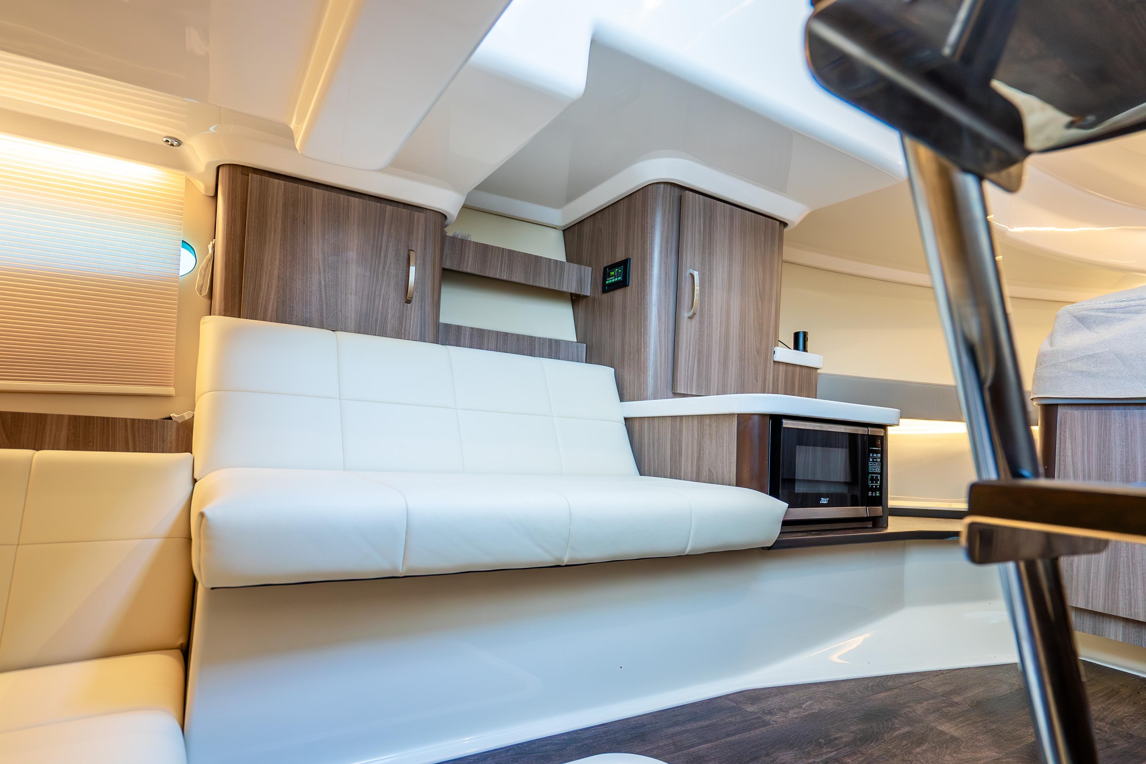 Interior of 2022 Regal 36 Grande Coupe with modern seating and cabinetry.