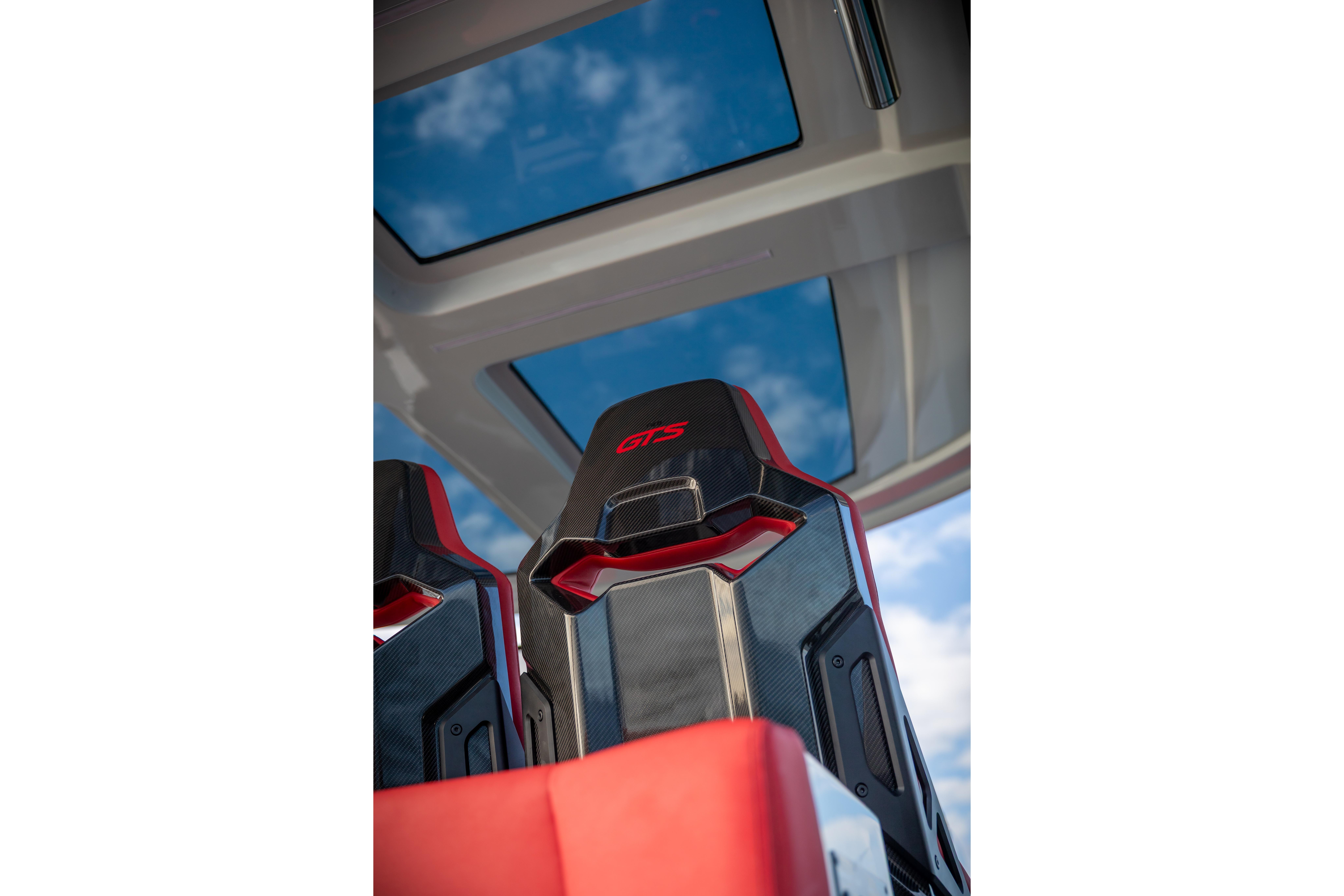 Interior of Tesoro 40 GTS 2026 with panoramic roof and sporty seats.