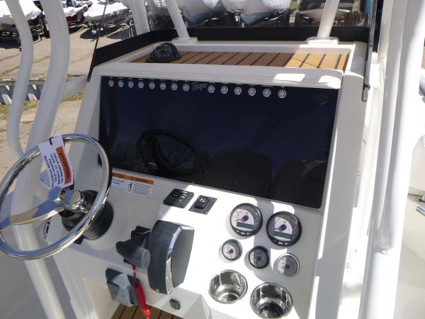 2024 Ranger 2360 Bay boat dashboard with steering wheel and gauges.