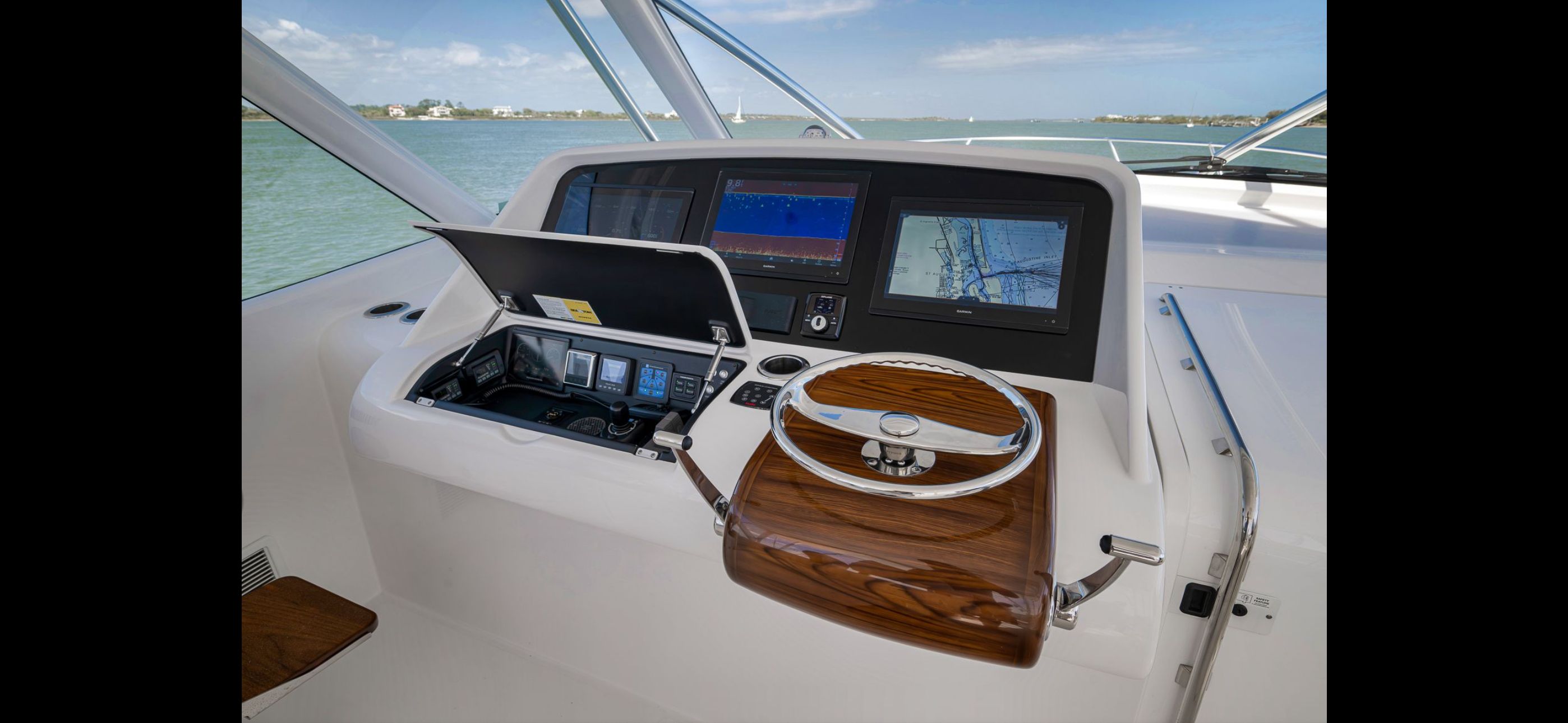 Helm of 2022 Mag Bay 42 Express on the water.