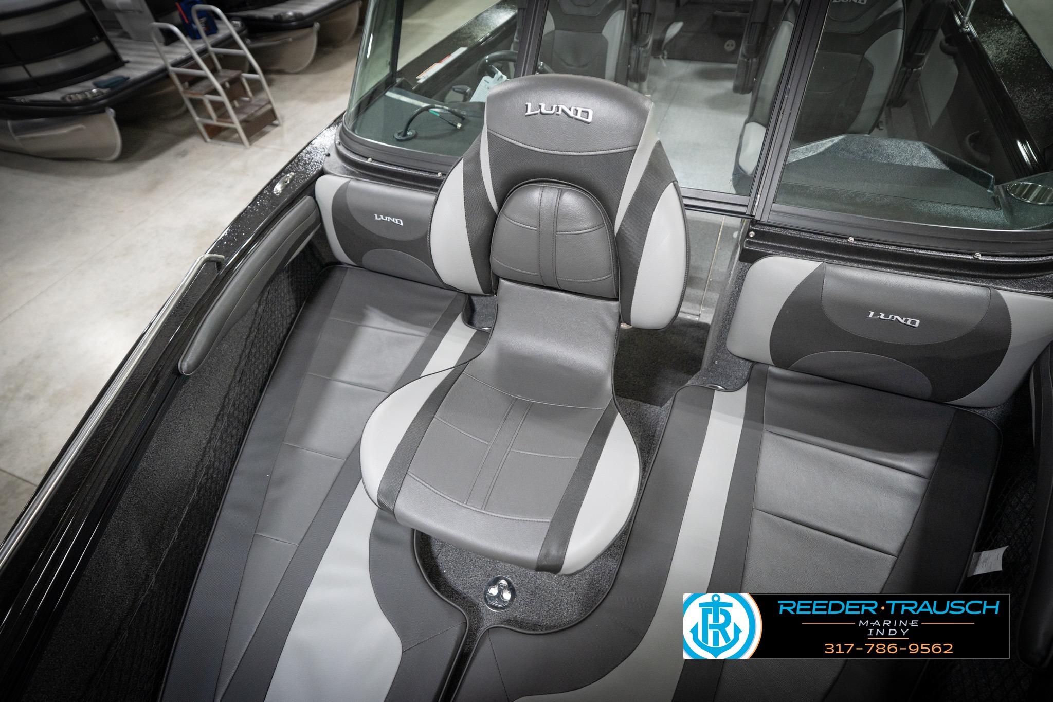 Interior of 2026 Lund 2275 Baron boat with sleek seating design.