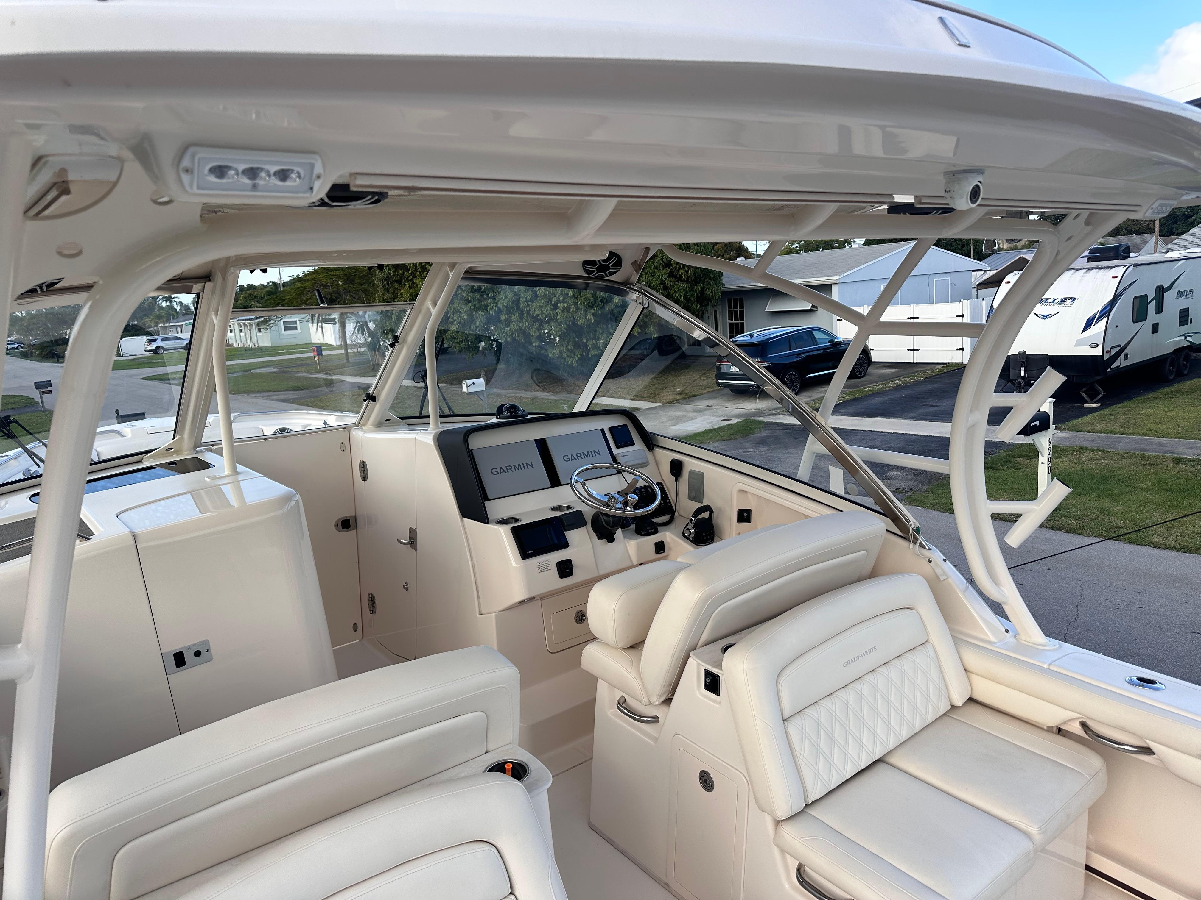 2019 Grady-White Freedom 325 boat interior with helm, seating, and navigation equipment.