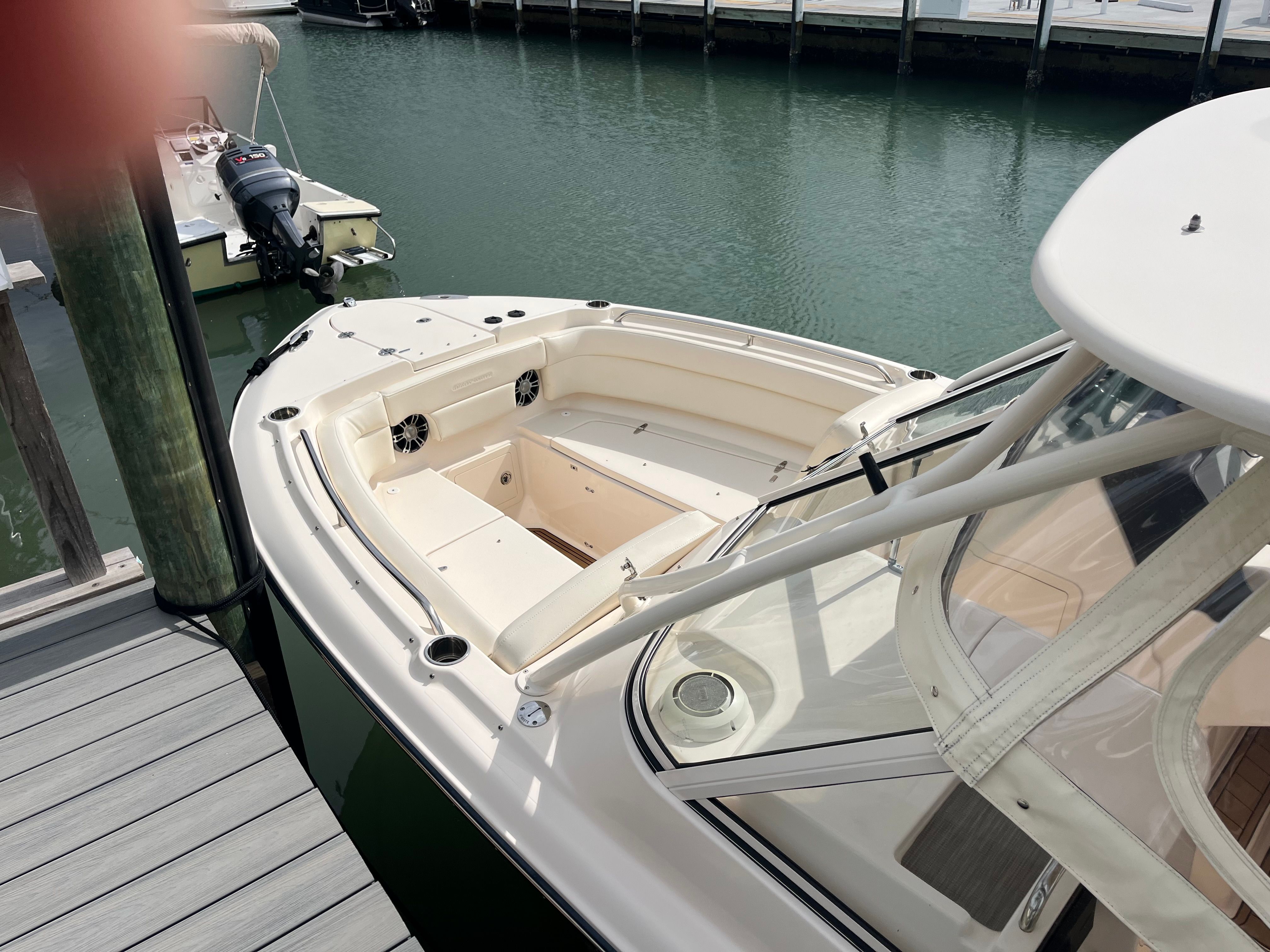 2022 Grady-White Freedom 275 boat at dock, front deck view.