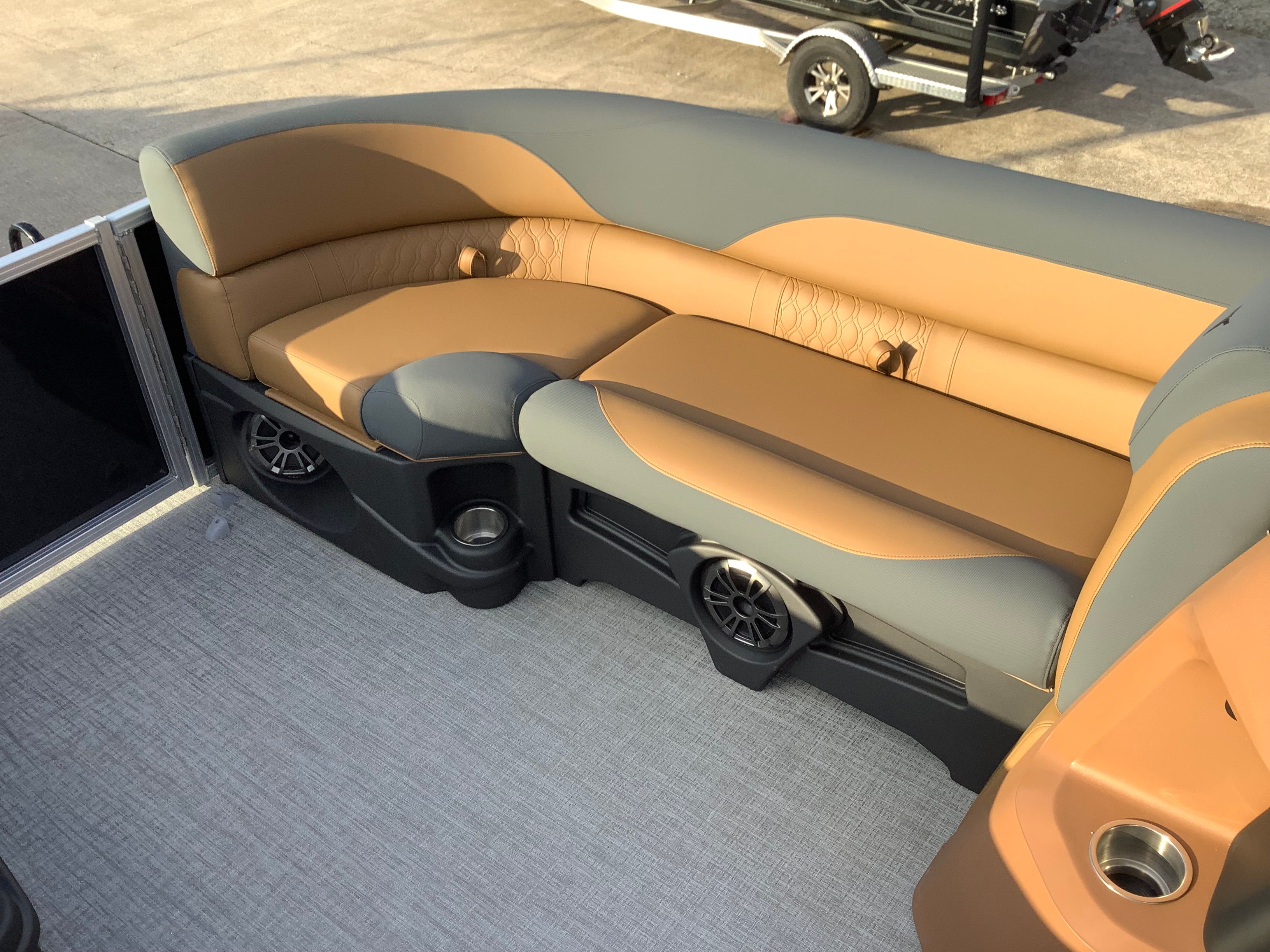 Luxurious seating in the 2026 Tahoe 2385 LTZ pontoon boat.