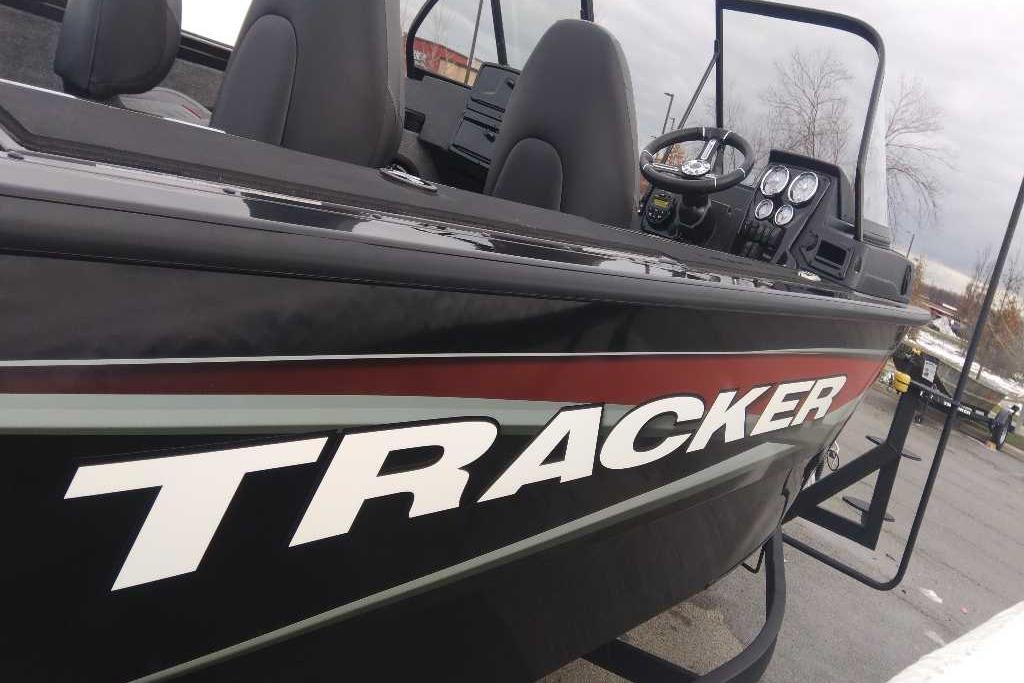 2026 Tracker Targa V-18 Combo boat, black exterior, close-up view of branding and dashboard.