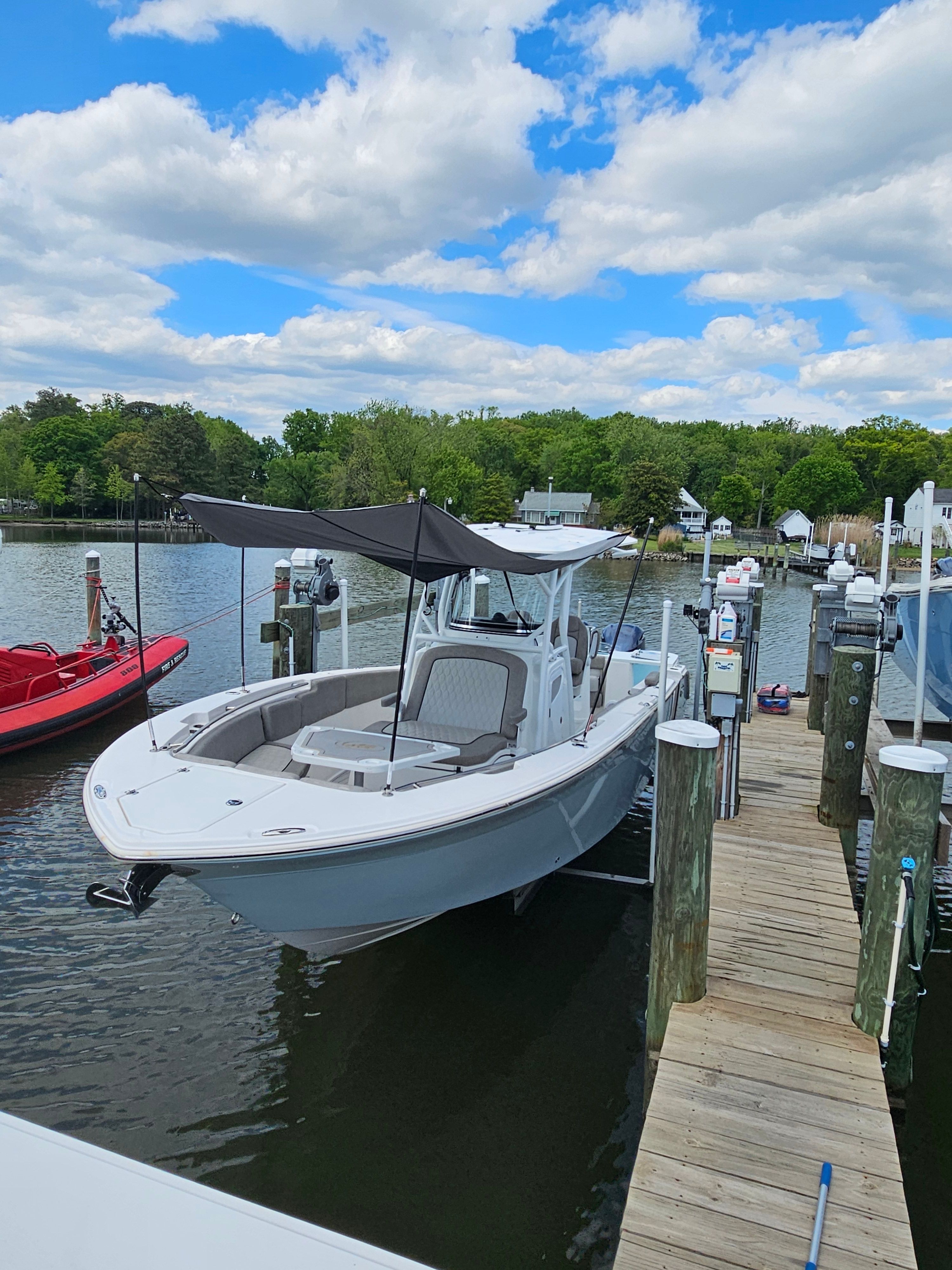 2021 Sea Fox 288 Commander docked on a sunny day.