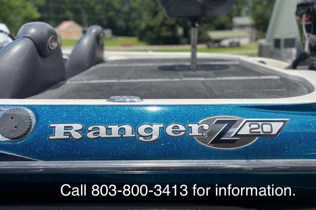 Close-up of Ranger Z20 Comanche boat with blue glitter finish and seating area.
