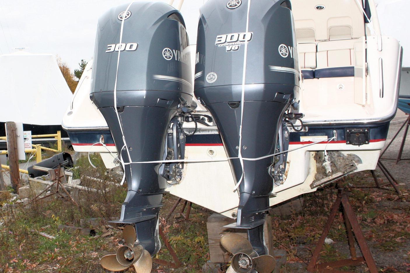 2013 Pursuit ST 310 Sport boat with twin Yamaha 300 V6 outboard engines.