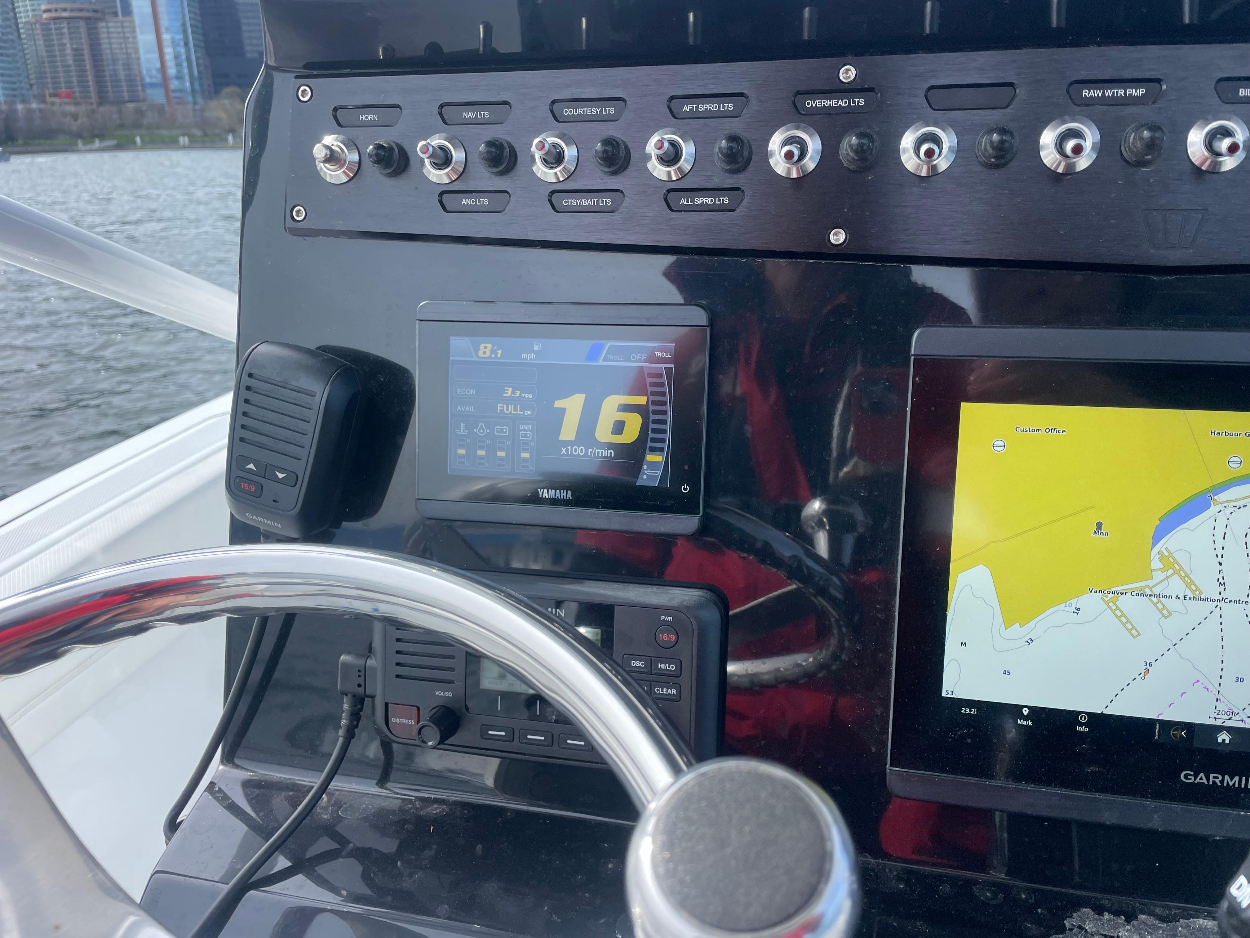 Dashboard of 2023 Wellcraft 222 Fisherman boat with navigation and control systems.