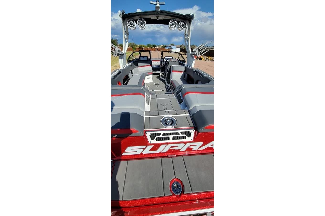 2023 Supra SE 550 boat interior with sleek seating and advanced audio system.