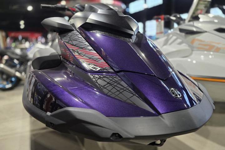 2026 Yamaha WaveRunner GP HO in showroom, featuring sleek purple design and modern styling.