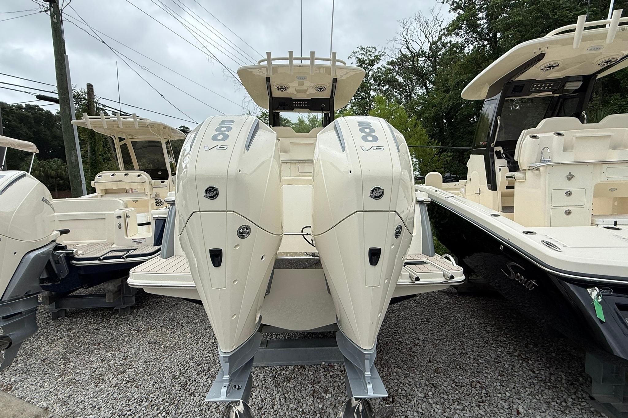 2026 Scout 260 LXF boat with twin 300 V6 engines, displayed outdoors.
