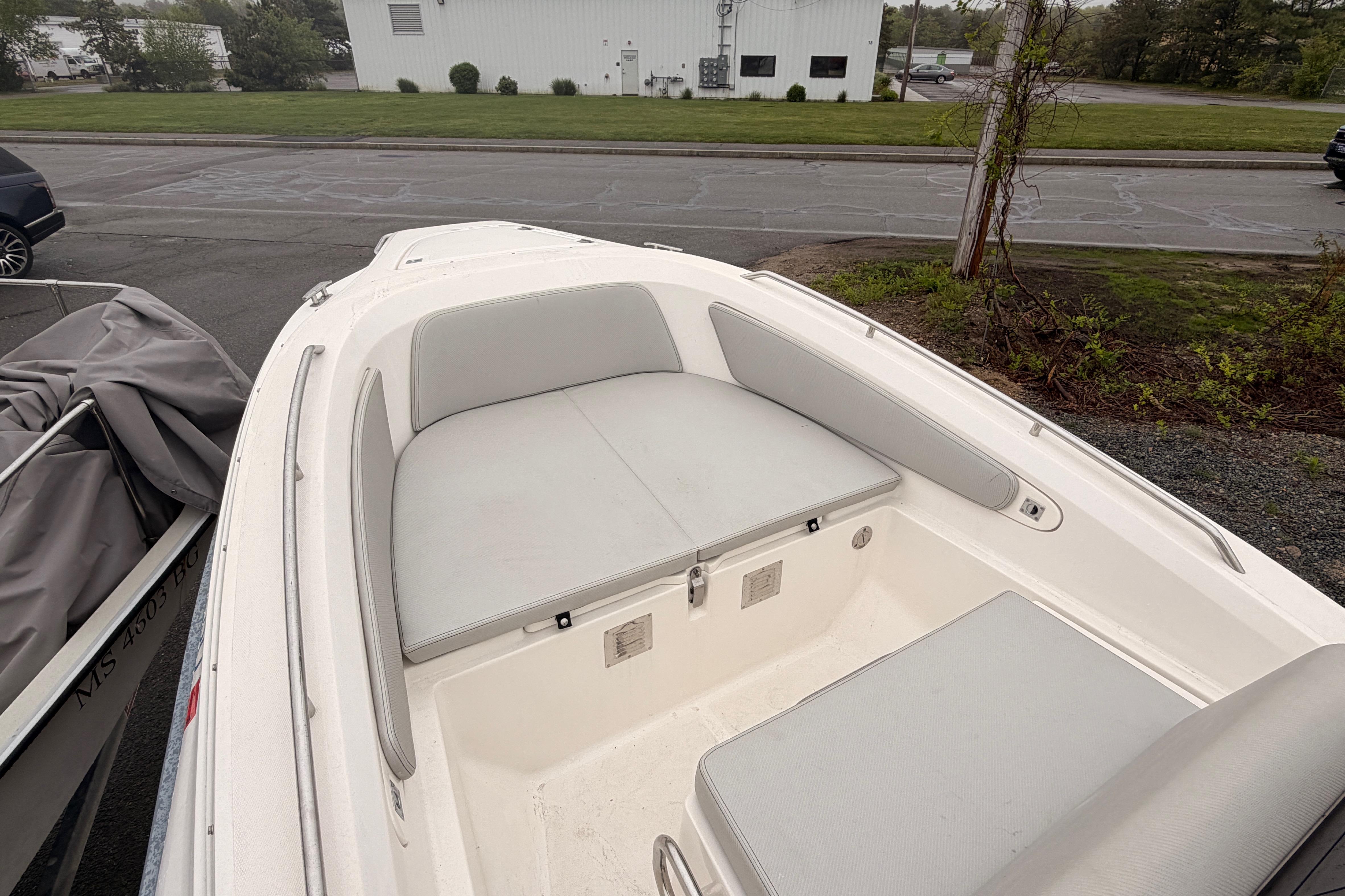 Interior view of Zar 79SL boat, 2022 model, featuring cushioned seating.