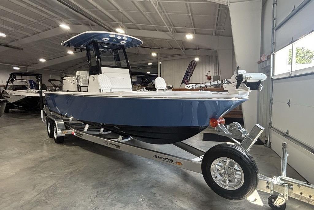 2026 Sportsman Masters 247 Bay Boat on trailer in showroom.
