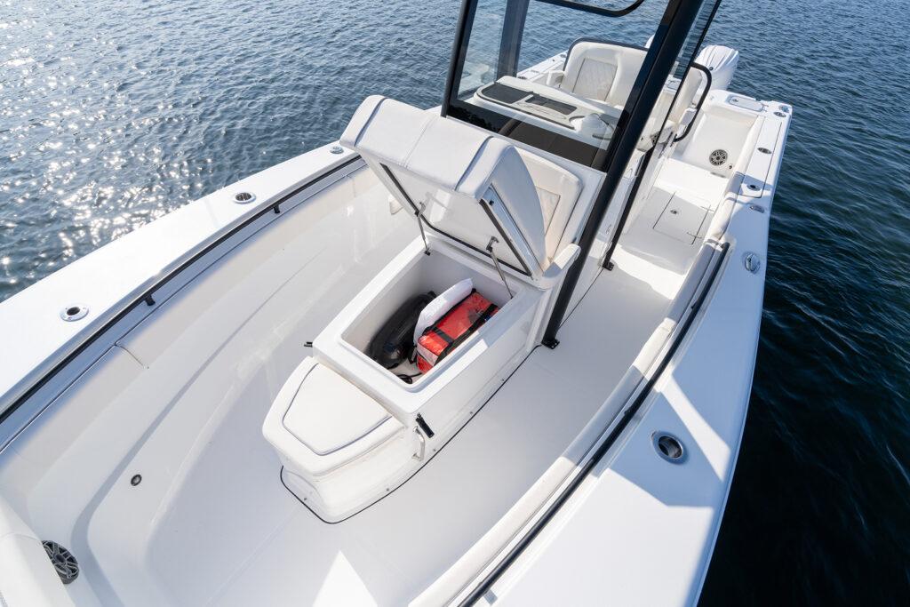 Manufacturer Provided Image: 2026 Sea Hunt Gamefish 27 Coffin Box boat on water, open storage compartment visible.