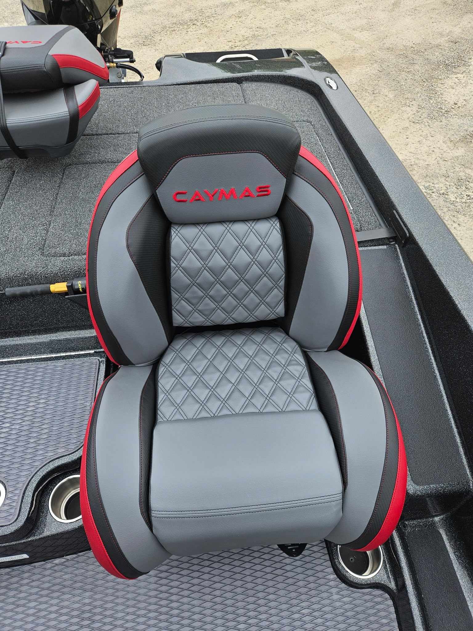 Caymas CX 21 PRO seat, gray leather with red accents, 2027 model.