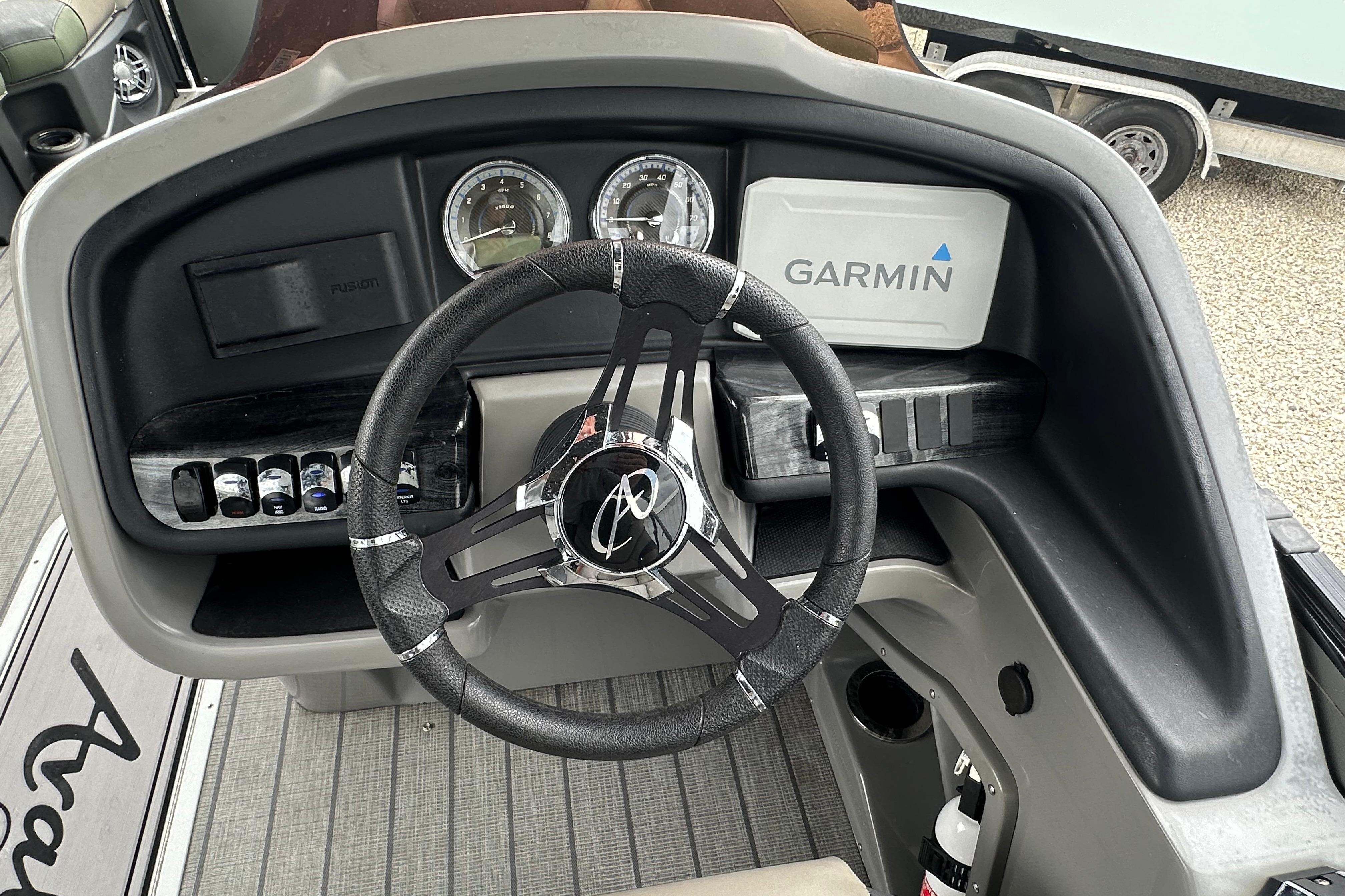 Steering console of 2023 Avalon Catalina Quad Lounge with Garmin navigation system.