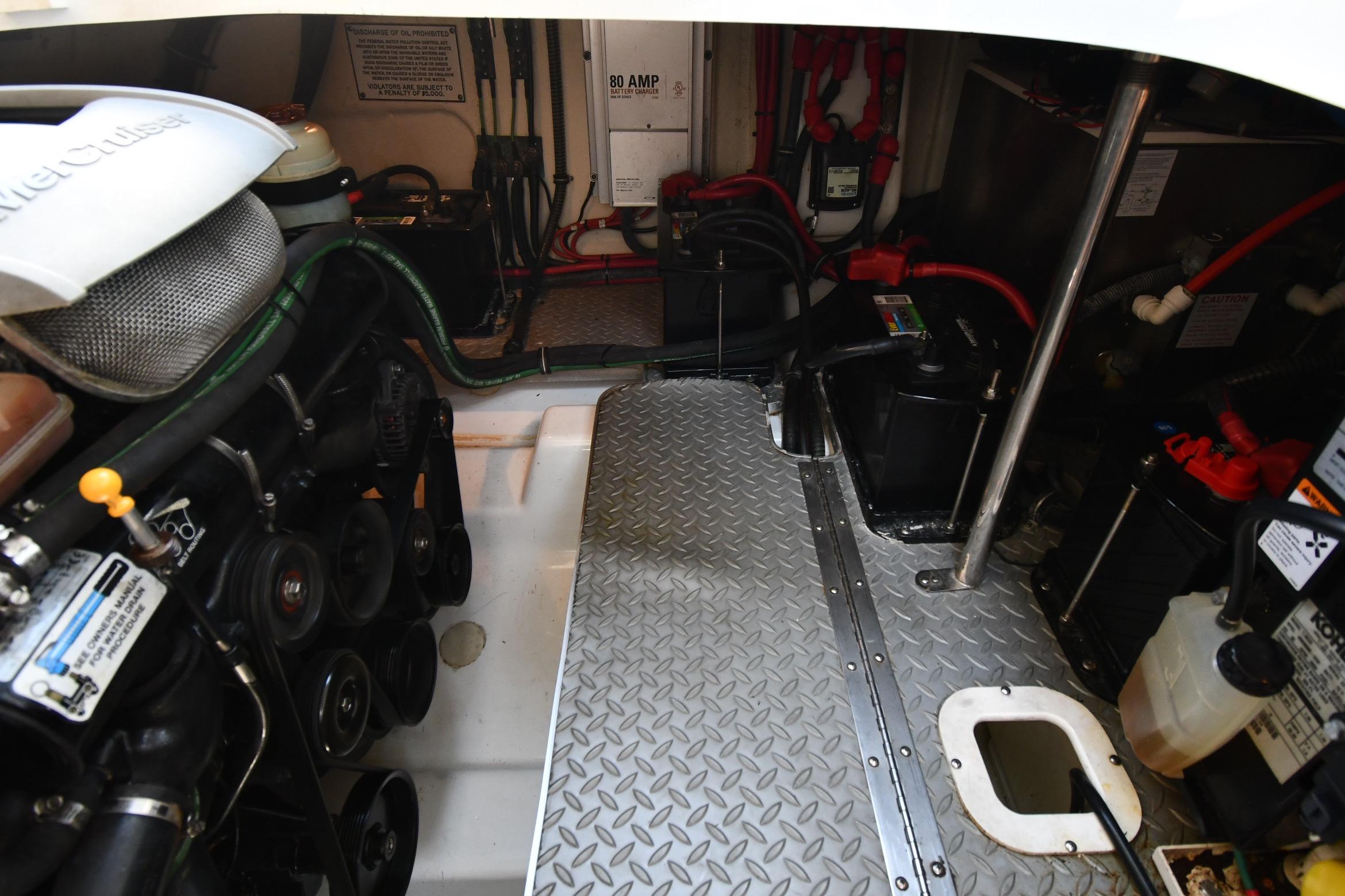 Engine room of a 2009 Formula 400 Super Sport boat, featuring mechanical components and wiring.