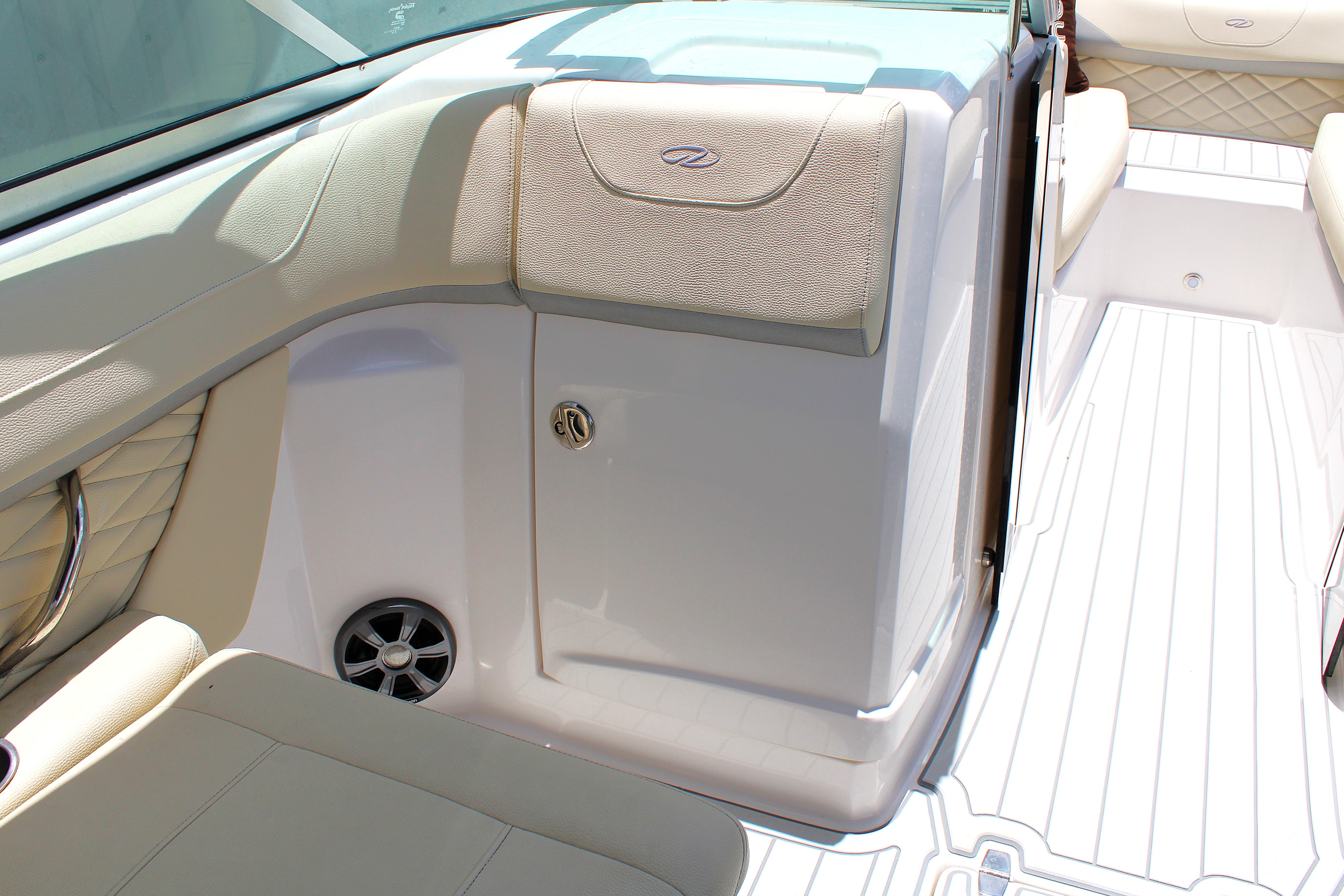 2021 Regal 26 OBX boat interior with beige seating and sleek design.