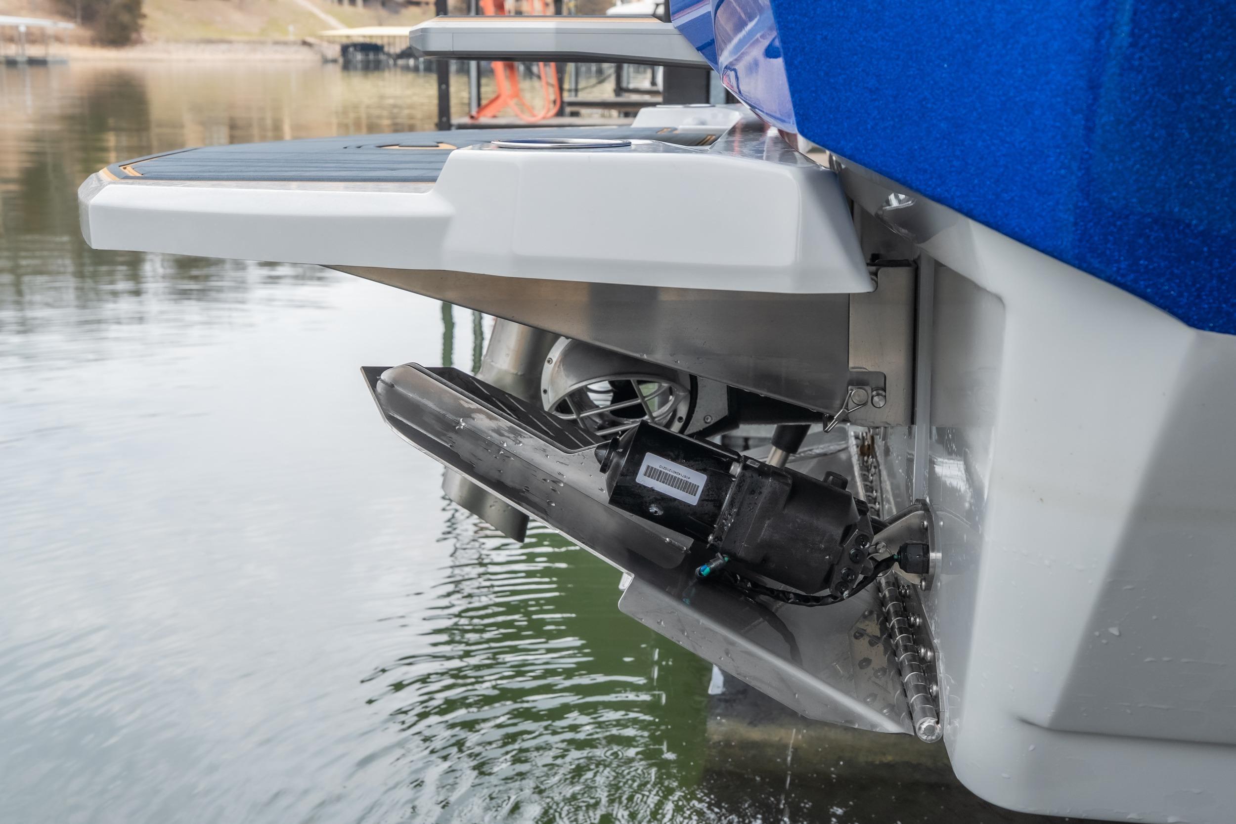 2026 Tigé Z3 boat with advanced wakeboarding technology on a calm lake.