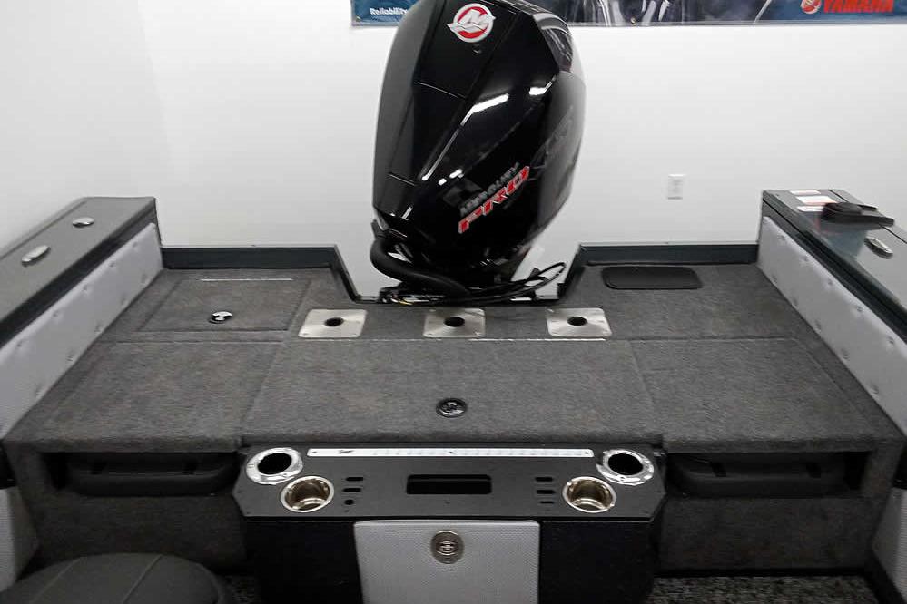 2026 Ranger VX1888 WT boat interior with motor, featuring spacious deck and storage compartments.