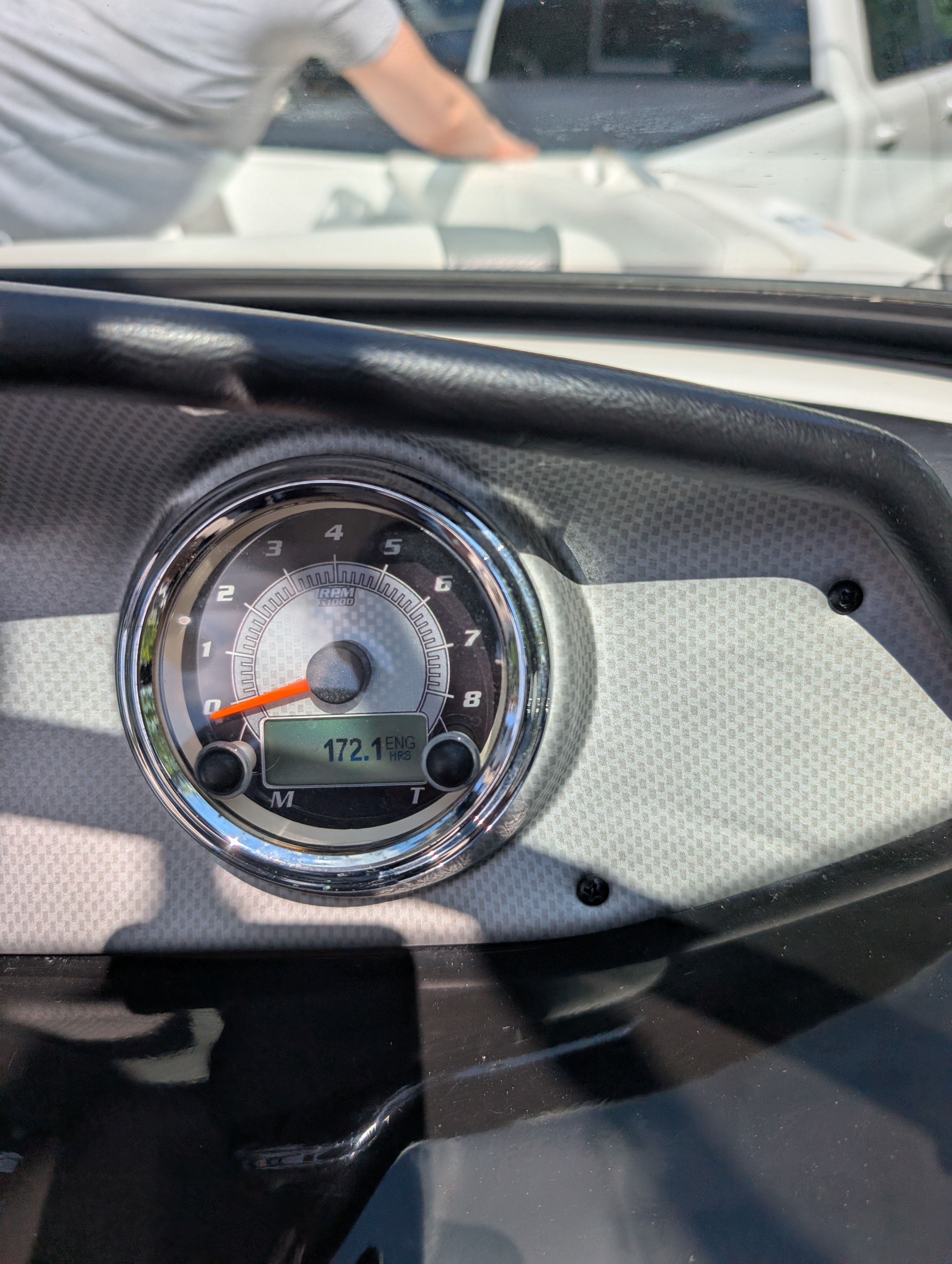 Close-up of a boat tachometer showing 172.1 hours.