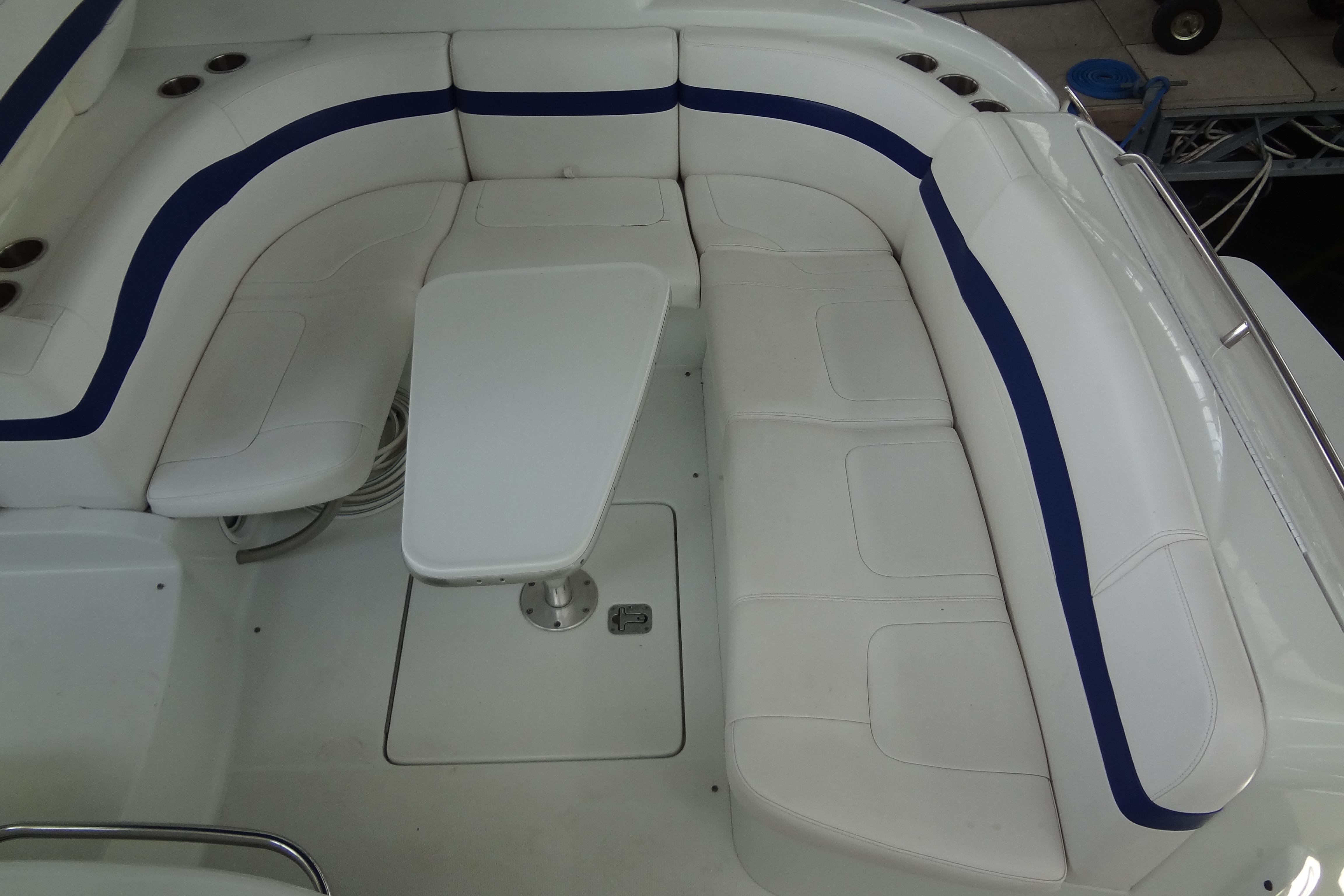 2007 Formula 34 Performance Cruiser interior with white seating and blue accents.