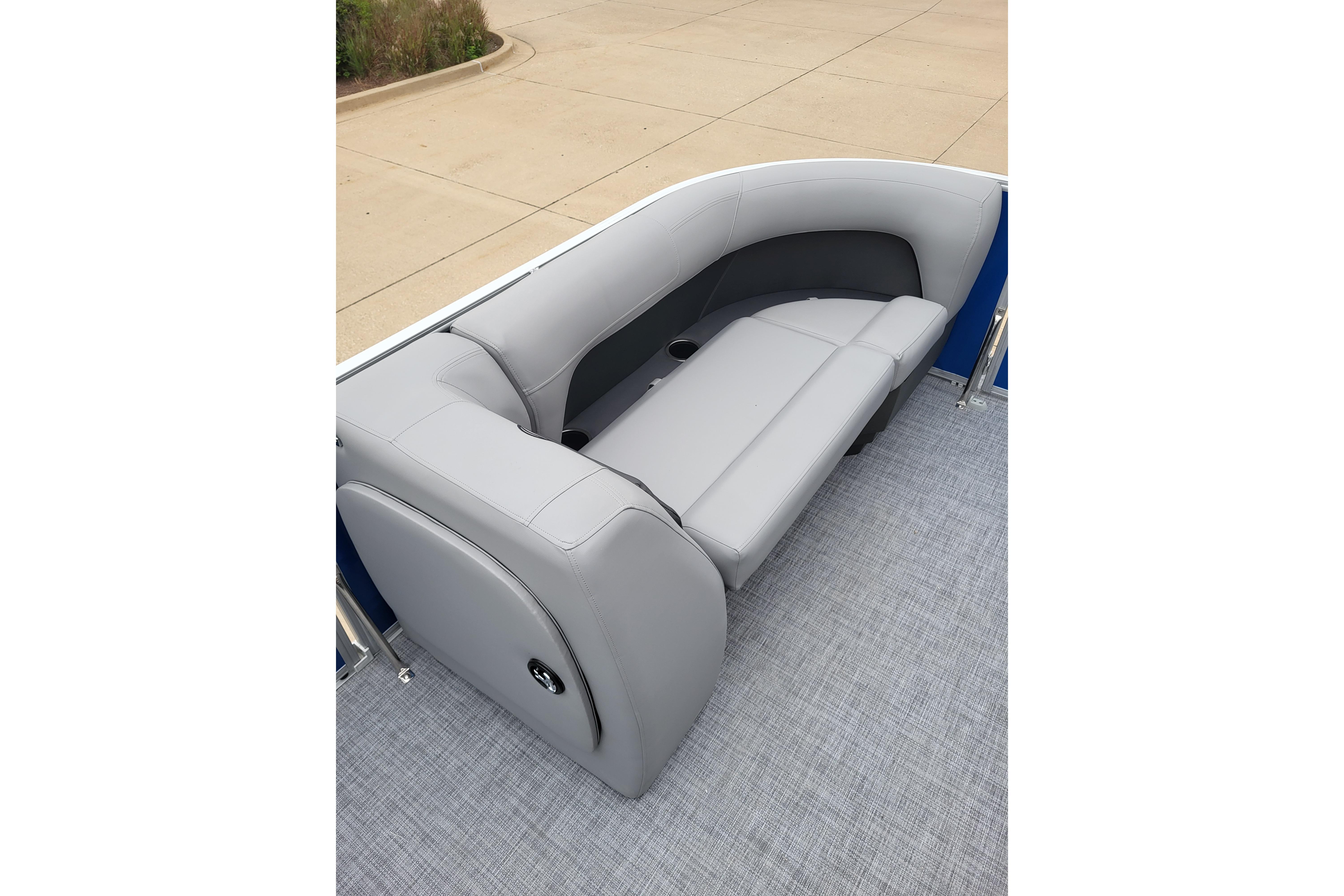 2026 Sun Tracker Party Barge 18 DLX with gray seating and spacious deck area.