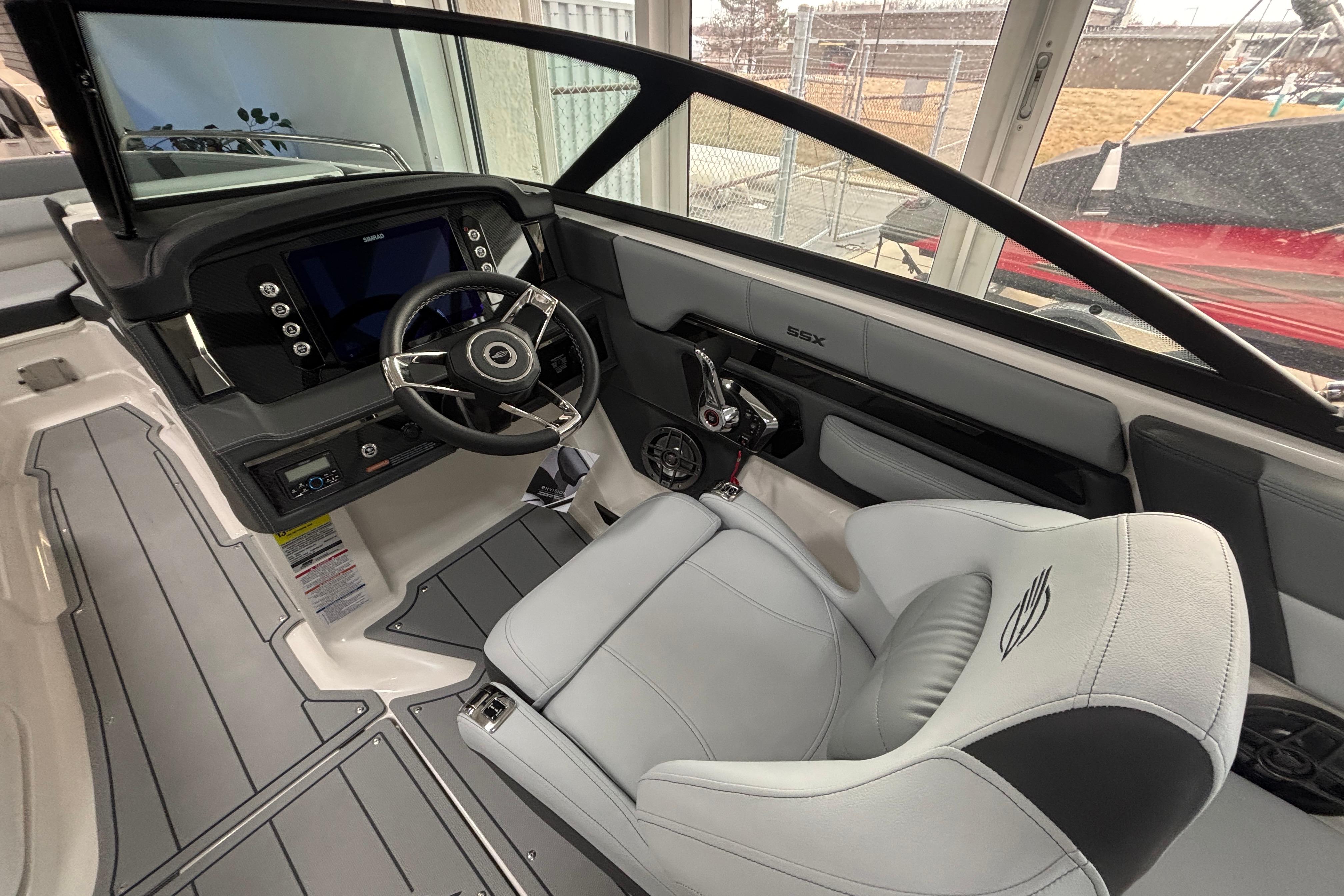 2026 Chaparral SSX 4 boat interior with modern steering and dashboard design.