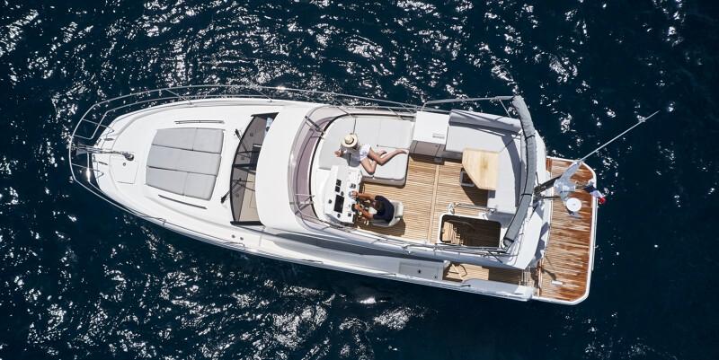 Aerial view of a 2023 Prestige 420 yacht on the sea.