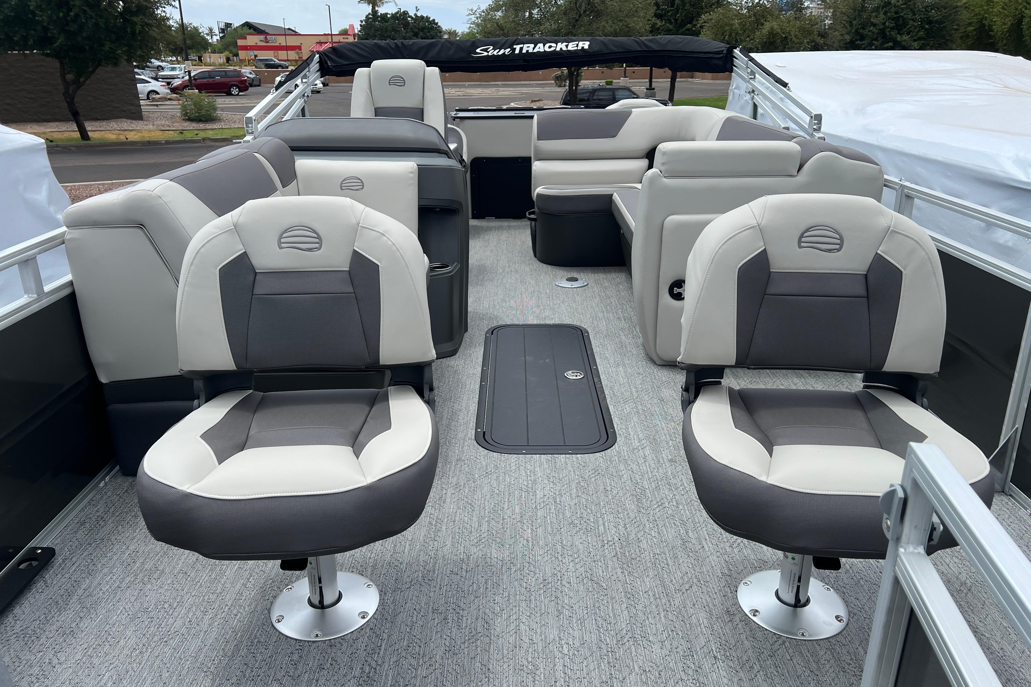 2026 Sun Tracker Fishin' Barge 22 XP3 interior with comfortable seating and spacious layout.