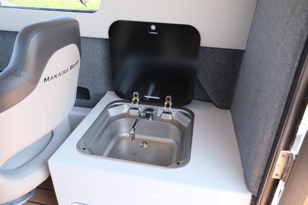 Makaira Gen3 800 boat interior with sink and seat, 2023 model.