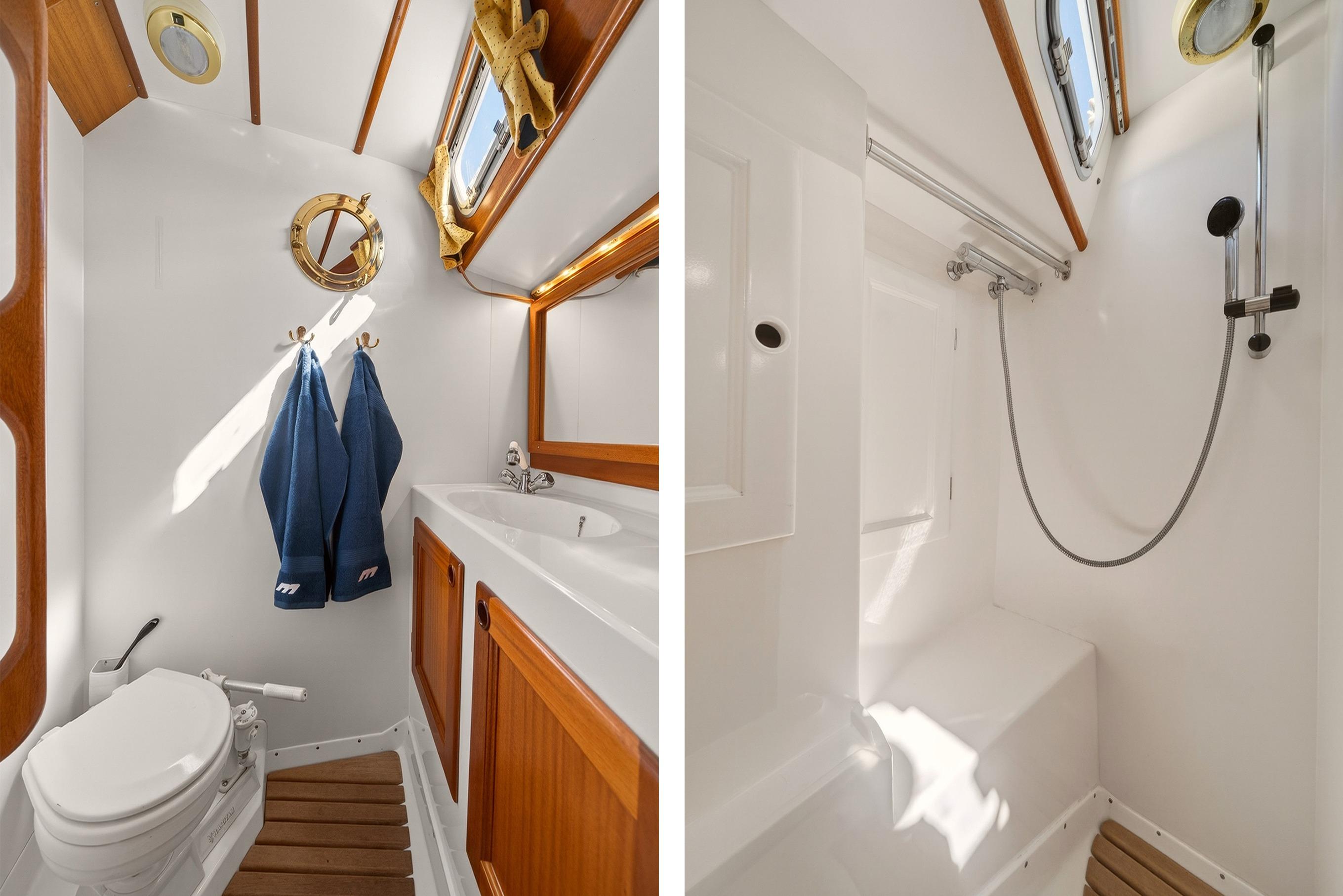 Luxurious Malo 42 yacht bathroom, featuring wooden accents and modern fixtures, 1997 model.